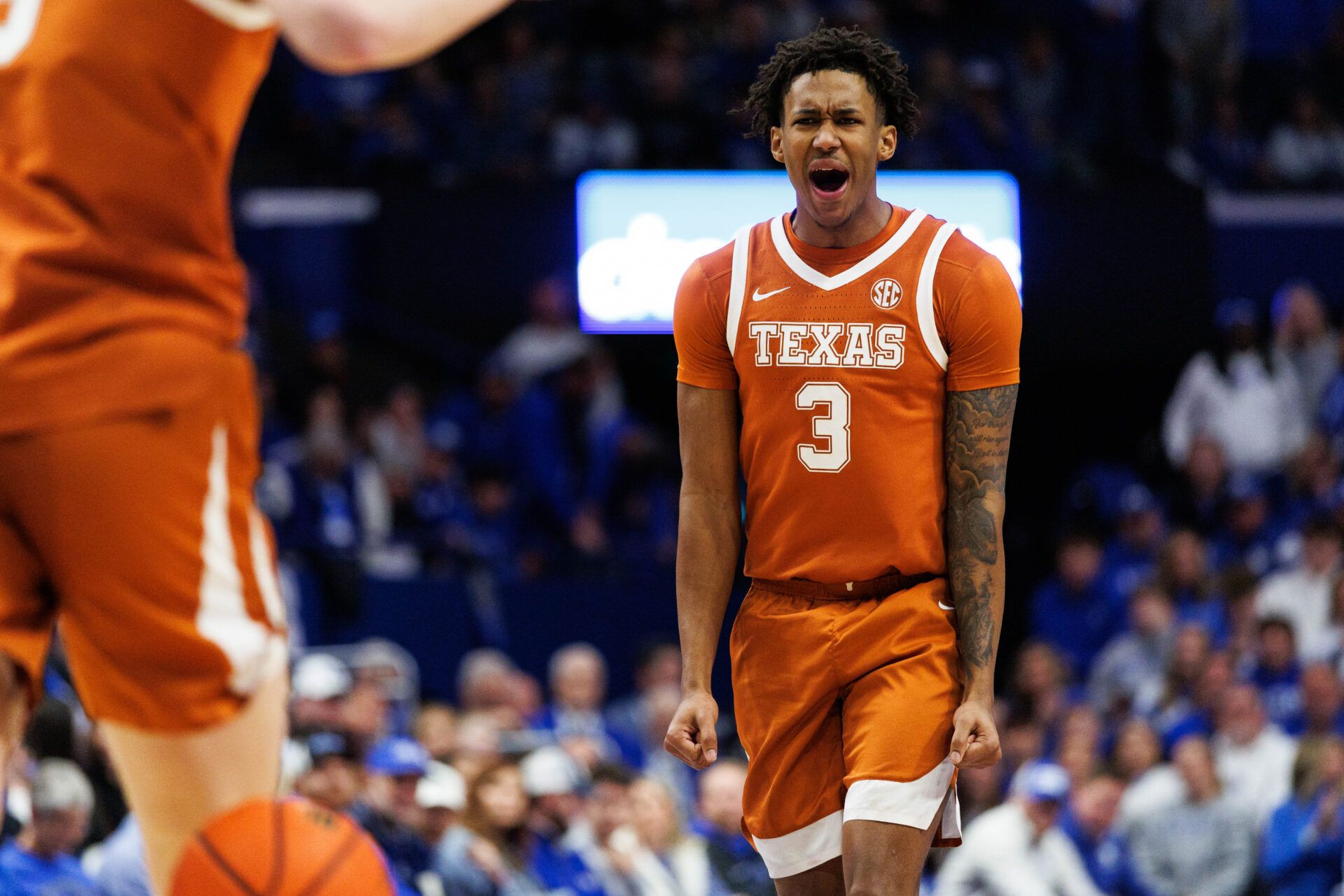 Texas Longhorns forward Dailyn Swain (3) celebrates after center Matas Vokietaitis (8) scores a basket during the first half against the Kentucky Wildcats at Rupp Arena at Central Bank Center.
