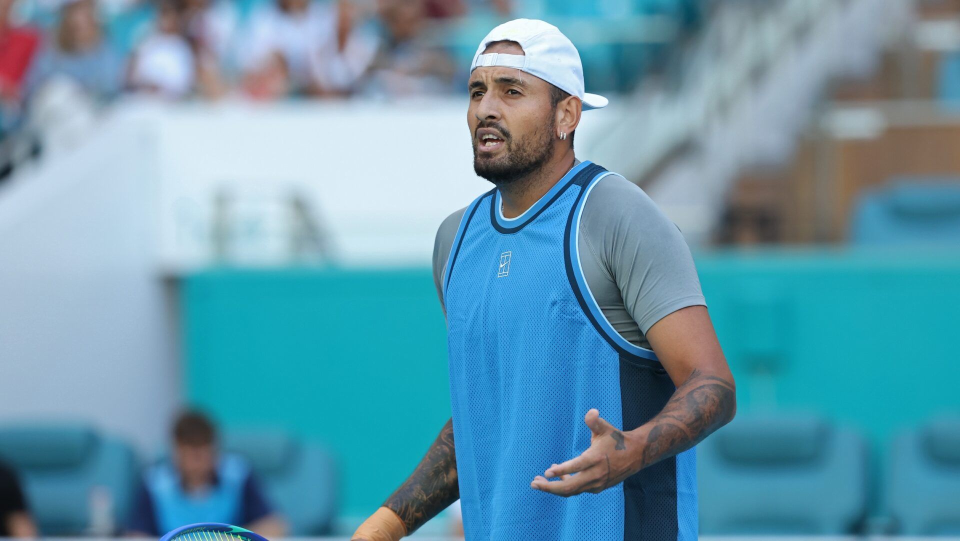 Nick Kyrgios (AUS) reacts towards his player's box after losing a point against Mackenzie McDonald (USA)(not pictured) on day two of the Miami Open at Hard Rock Stadium.