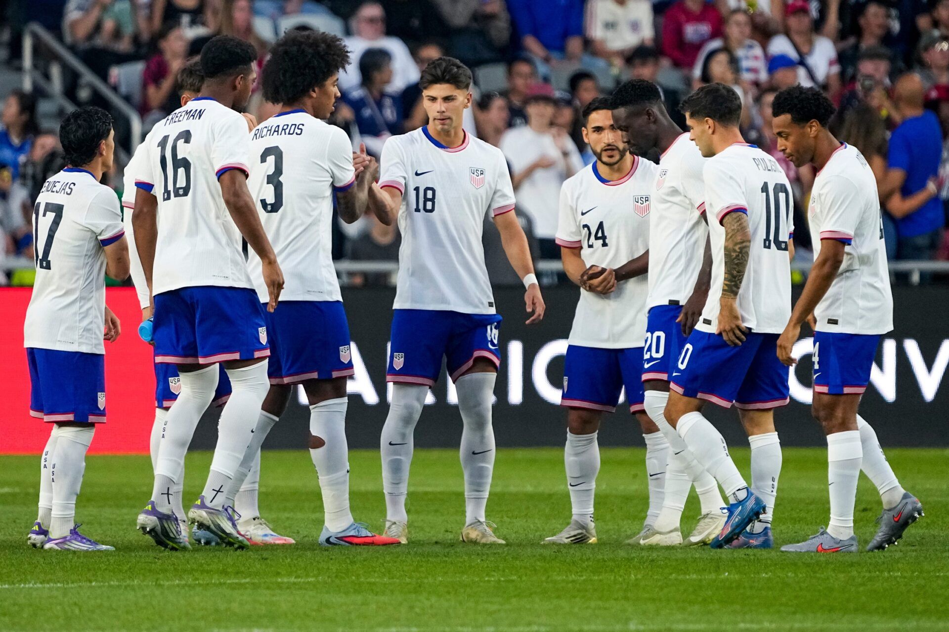 United States defender Max Arfsten (18) high fives teammates prior to an international friendly soccer match against Japan at Lower.com Field in Columbus on Sept. 9, 2025. The United States Men's National Team won 2-0.