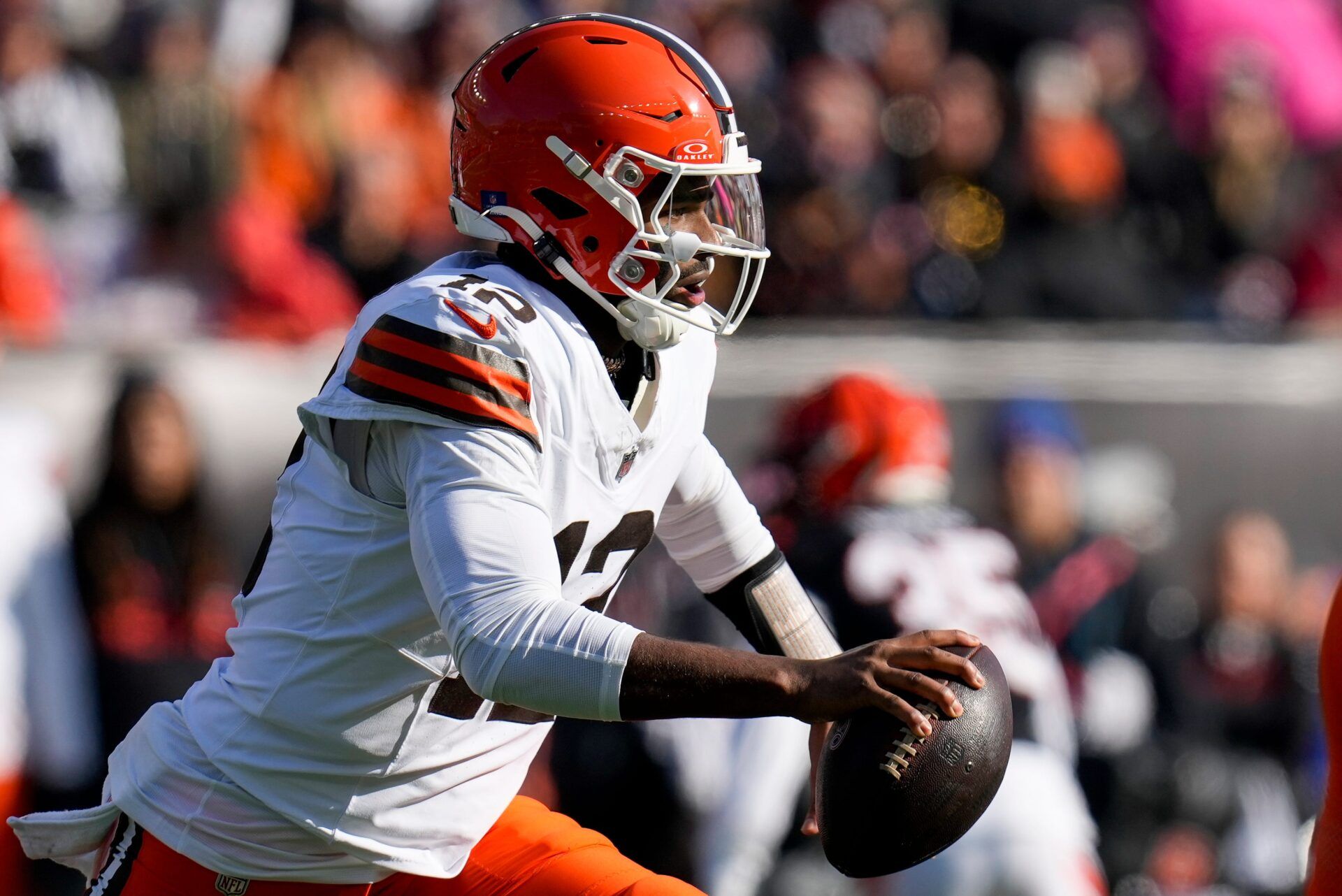 Cleveland Browns quarterback Shedeur Sanders (12) scrambles in the first quarter against the Cincinnati Bengals at Paycor Stadium.