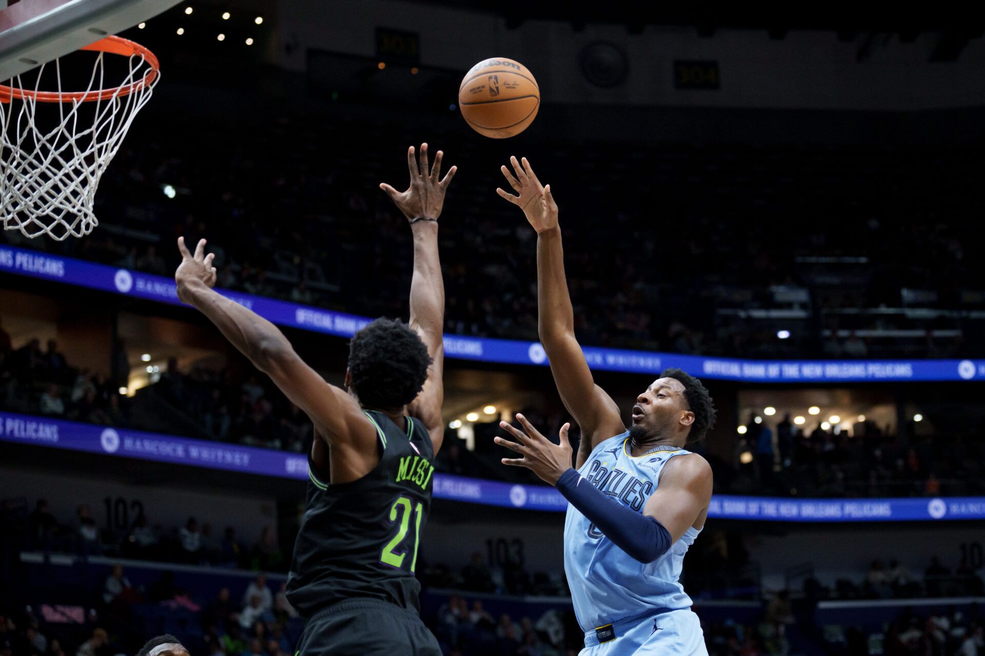 Memphis Grizzlies forward Jaren Jackson Jr. (8) shoots against New Orleans Pelicans center Yves Missi (21) during the first half at Smoothie King Center.