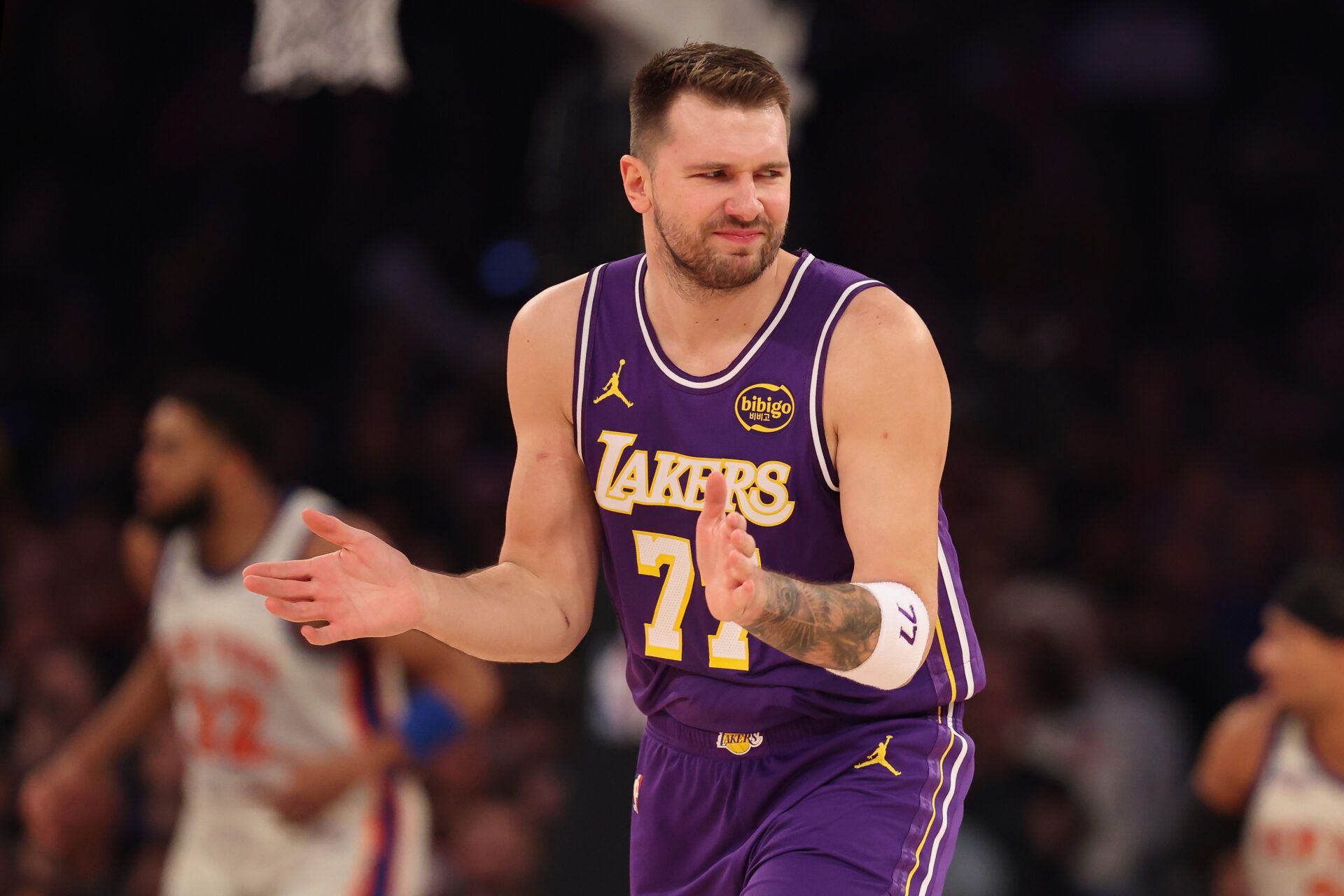 NEW YORK, NEW YORK - FEBRUARY 01: Luka Doncic #77 of the Los Angeles Lakers reacts to missing a 3-point basket during the first quarter against the New York Knicks at Madison Square Garden on February 01, 2026 in New York City. NOTE TO USER: User expressly acknowledges and agrees that, by downloading and or using this photograph, user is consenting to the terms and conditions of the Getty Images License Agreement. (Photo by Ishika Samant/Getty Images)