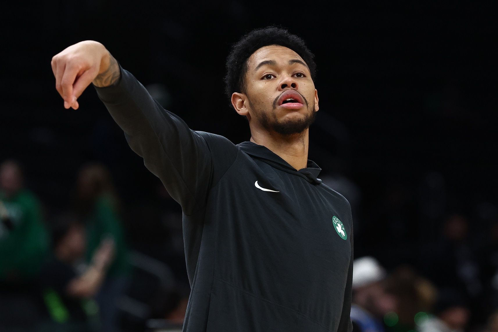 Boston Celtics guard Anfernee Simons (4) shoots before their game against the Sacramento Kings at TD Garden.