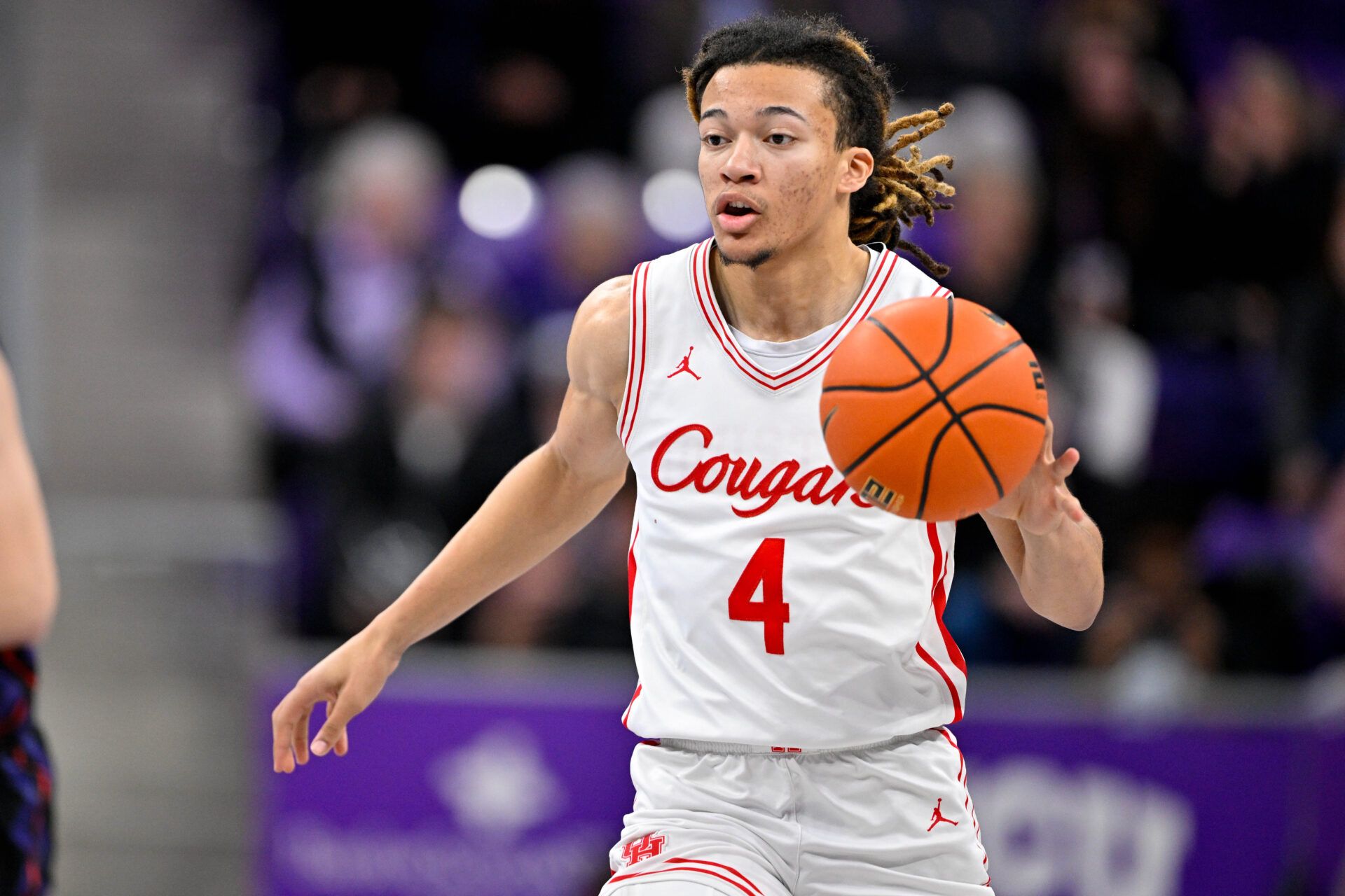 Houston Cougars guard Kingston Flemings (4) brings the ball up court during the game at Ed and Rae Schollmaier Arena.