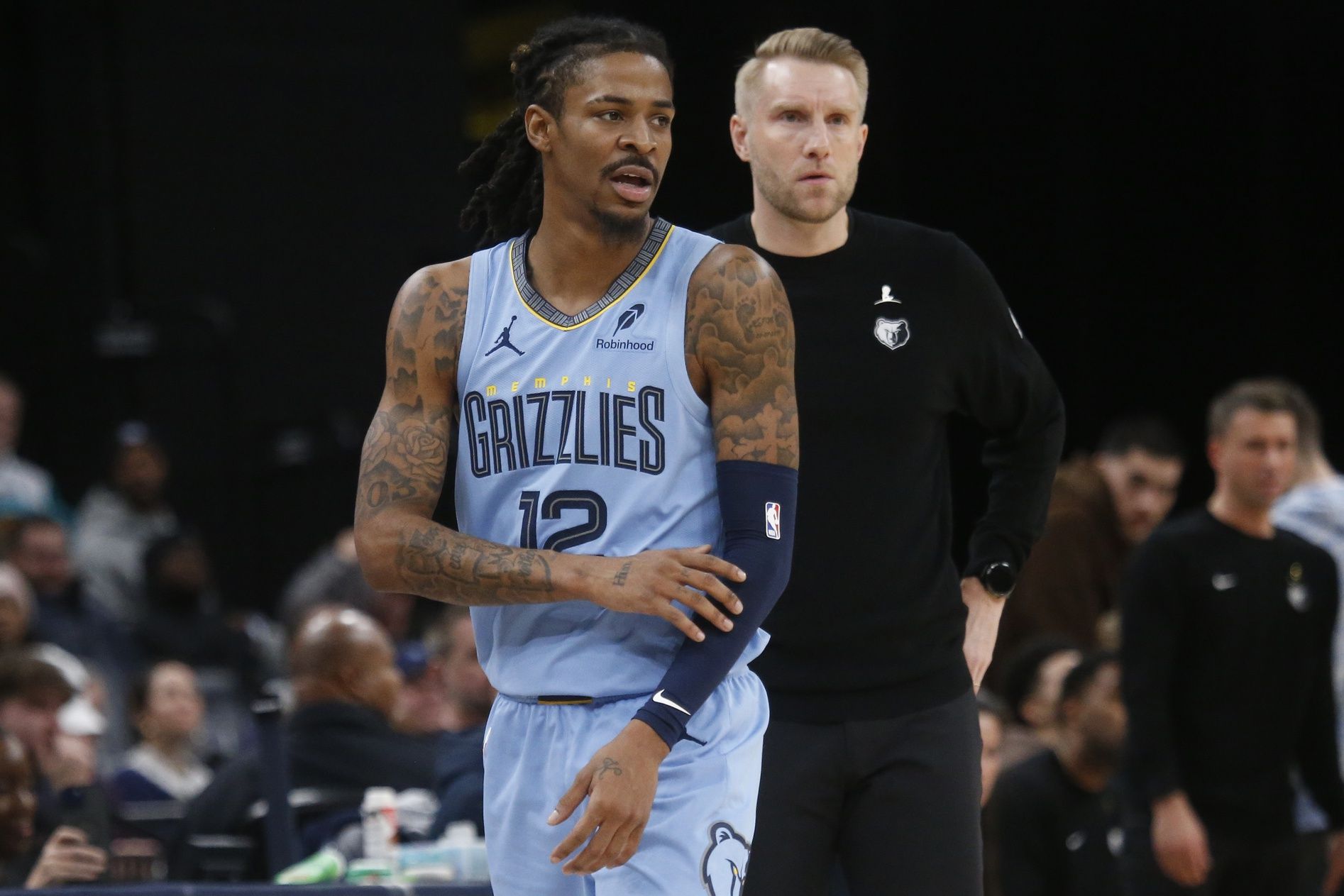 Memphis Grizzlies guard Ja Morant (12) and head coach Tuomas Iisalo looks on during the third quarter against the Atlanta Hawks at FedExForum.
