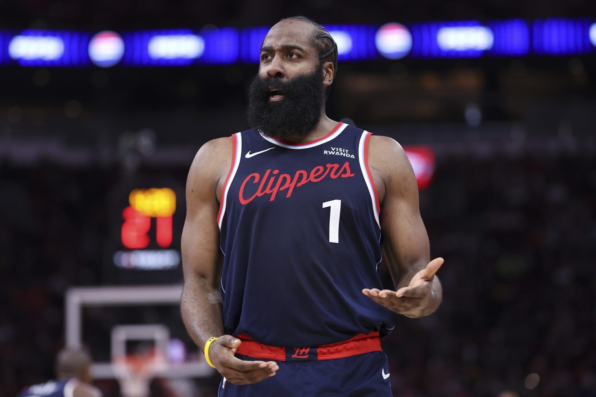 Los Angeles Clippers guard James Harden (1) reacts after a play during the third quarter against the Houston Rockets at Toyota Center.