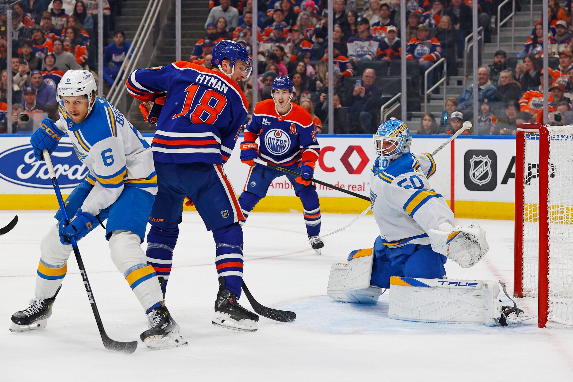 Edmonton Oilers forward Zach Hyman (18) deflects a shot wide of St. Louis Blues goaltender Jordan Binnington (50) during the first period at Rogers Place.