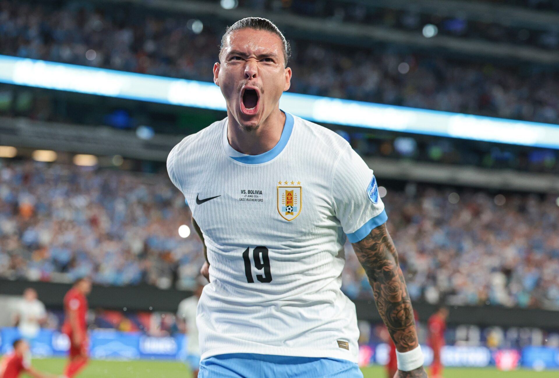 Uruguay forward Darwin Nunez (19) celebrates his goal past Bolivia goalkeeper Guillermo Viscarra (23) during the first half of the Copa America match at MetLife Stadium.