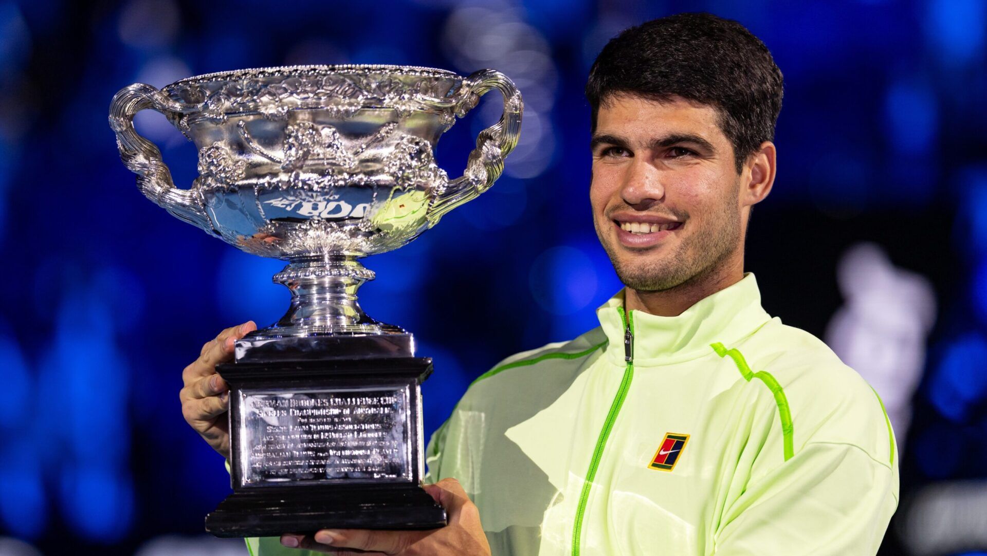 Carlos Alcaraz of Spain with the Norman Brookes Challenge Cup after his victory over Novak Djokovic of Serbia in the final of the mens singles at the Australian Open at Rod Laver Arena in Melbourne Park.