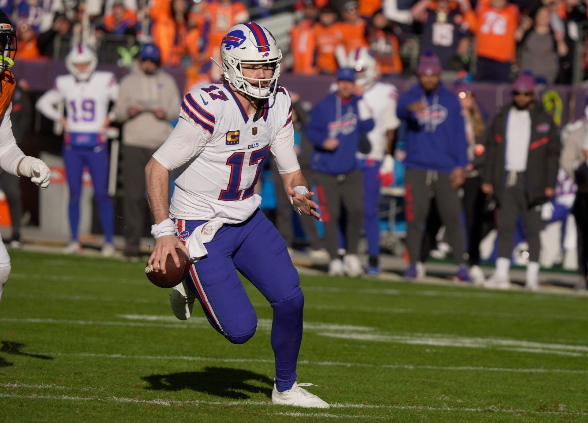 Buffalo Bills quarterback Josh Allen keeps the ball and gets about five yards on the play during first half action at Empower FIeld at Mile High in Denver, Colorado on Jan. 17, 2026.