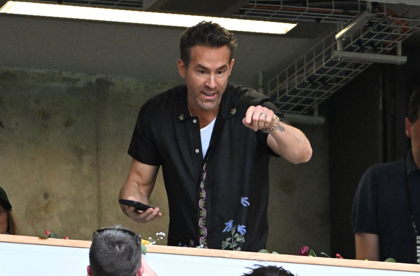 Wrexham FC owner Ryan Reynolds with fans prior to the match between Wrexham FC and Vancouver Whitecaps FC at BC Place.