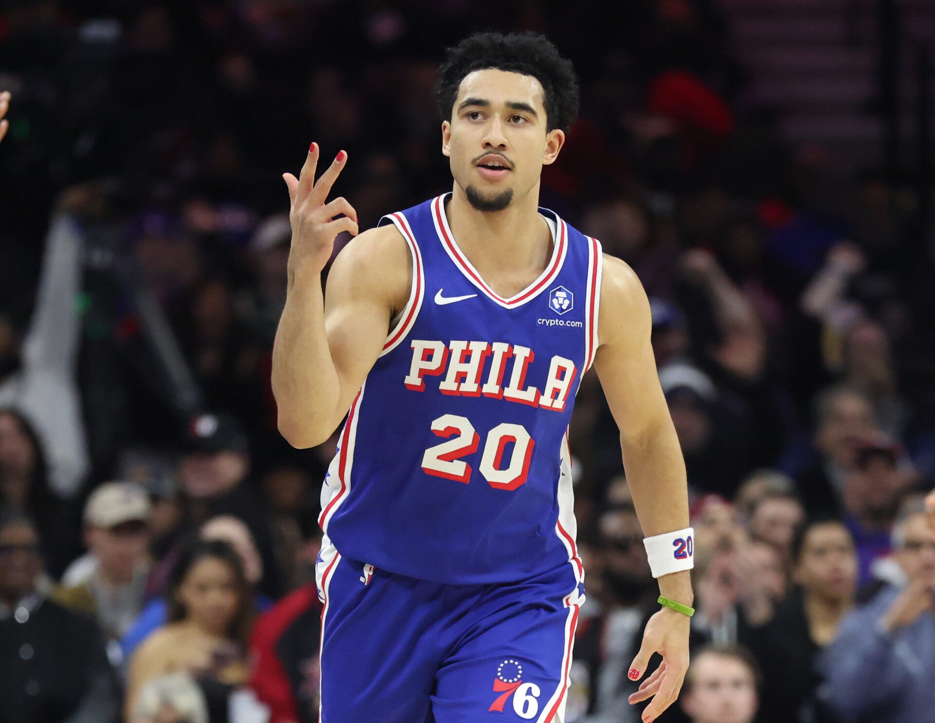 Philadelphia 76ers guard Jared McCain (20) reacts to his three pointer against the Milwaukee Bucks during the first quarter at Xfinity Mobile Arena.