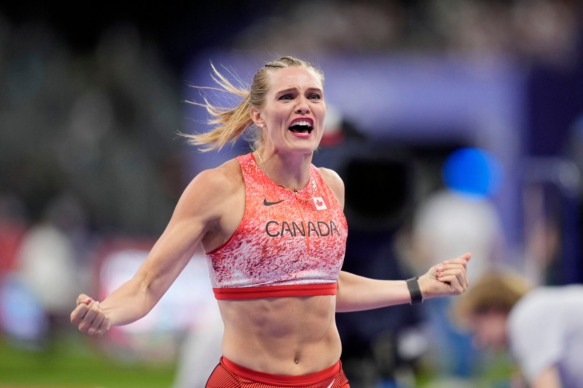 Alysha Newman (CAN) reacts after clearing 4.85m in the womens pole vault final during the Paris 2024 Olympic Summer Games at Stade de France.