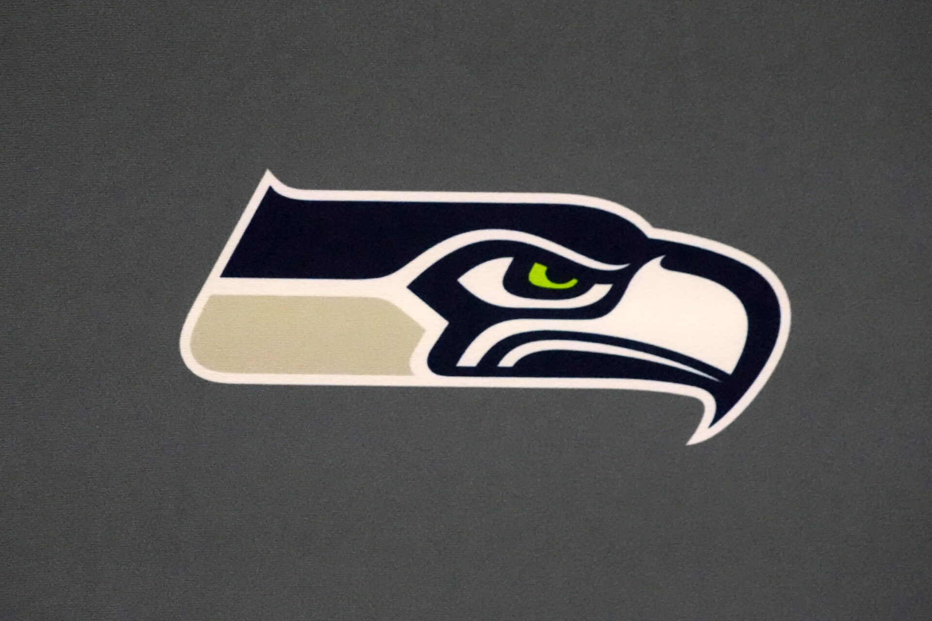 The Seattle Seahawks logo at Super Bowl LX press conference at the San Jose Convention Center.
