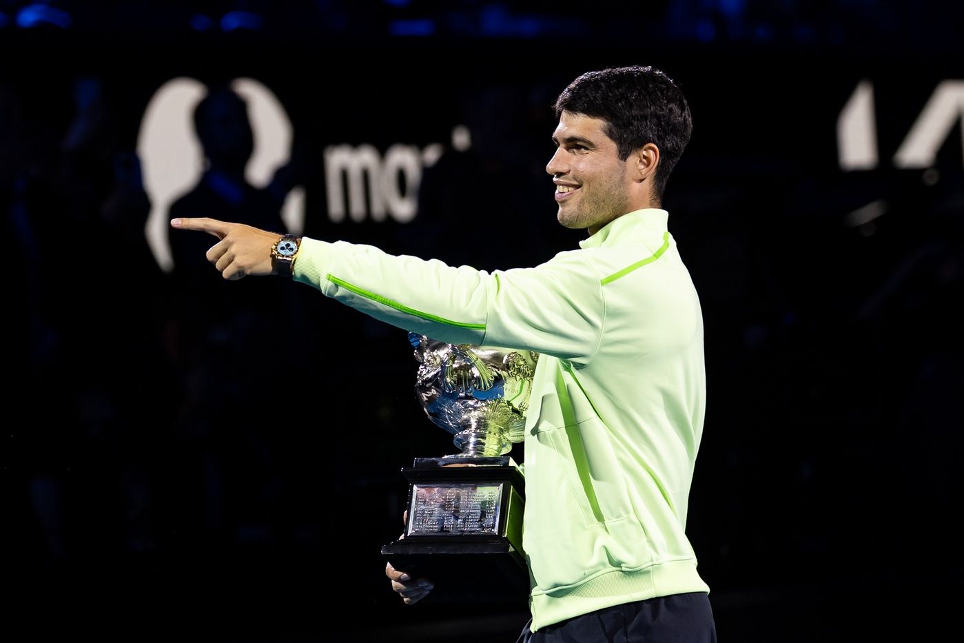 Carlos Alcaraz of Spain with the Norman Brookes Challenge Cup after his victory over Novak Djokovic of Serbia in the final of the mens singles at the Australian Open at Rod Laver Arena in Melbourne Park.