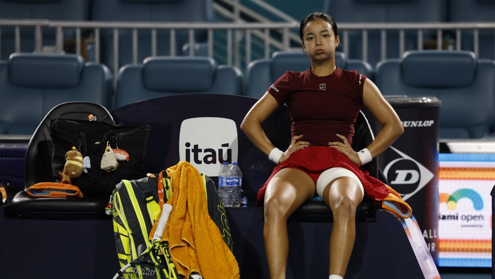 Alexandra Eala (PHL) sits in her player's chair after her match against Jessica Pegula (USA)(not pictured) in a women's singles semifinal on day ten of the Miami Open at Hard Rock Stadium.