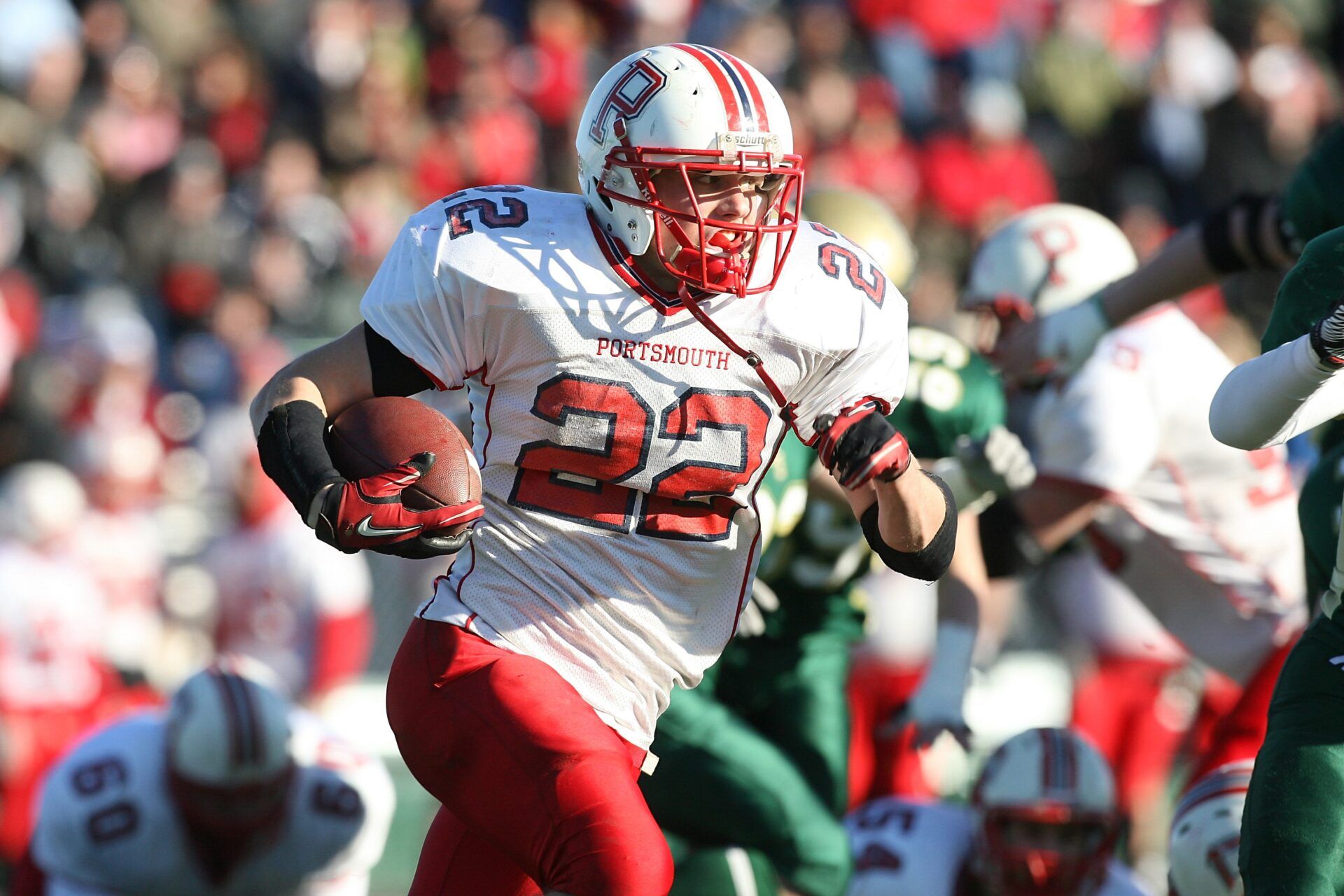 Saturday December 4, 2010 Cranston ,RI The Providence Journal/Bob Breidenbach Div I High School Superbowl with Bishop Hendricken defeating Portsmouth 20-17. Photo shows Portsmouth QB #22 Ben Willett as he runs for yards in the 1st half.
