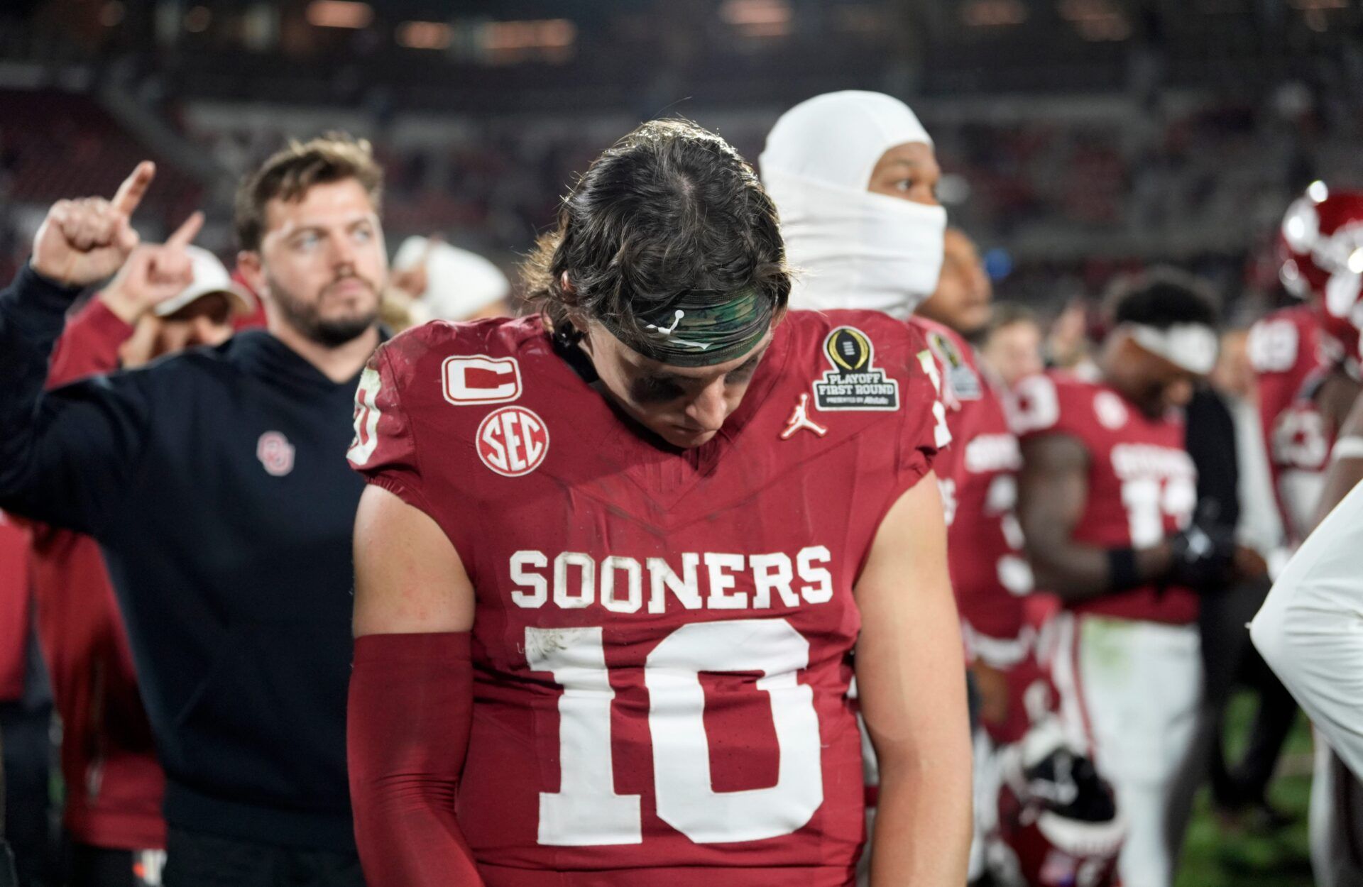 Oklahoma's John Mateer (10) reacts following the College Football Playoff game between the University of Oklahoma Sooners (OU) and the Alabama Crimson Tide at the Gaylord Family – Oklahoma Memorial Stadium in Norman, Okla., Friday Dec. 19, 2025.