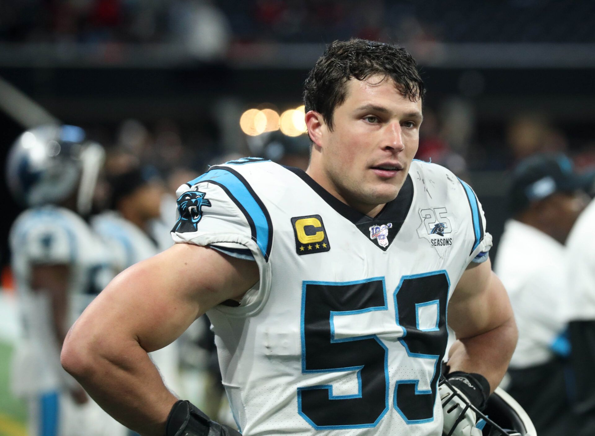 Carolina Panthers middle linebacker Luke Kuechly (59) reacts after a play in the fourth quarter against the Atlanta Falcons at Mercedes-Benz Stadium.