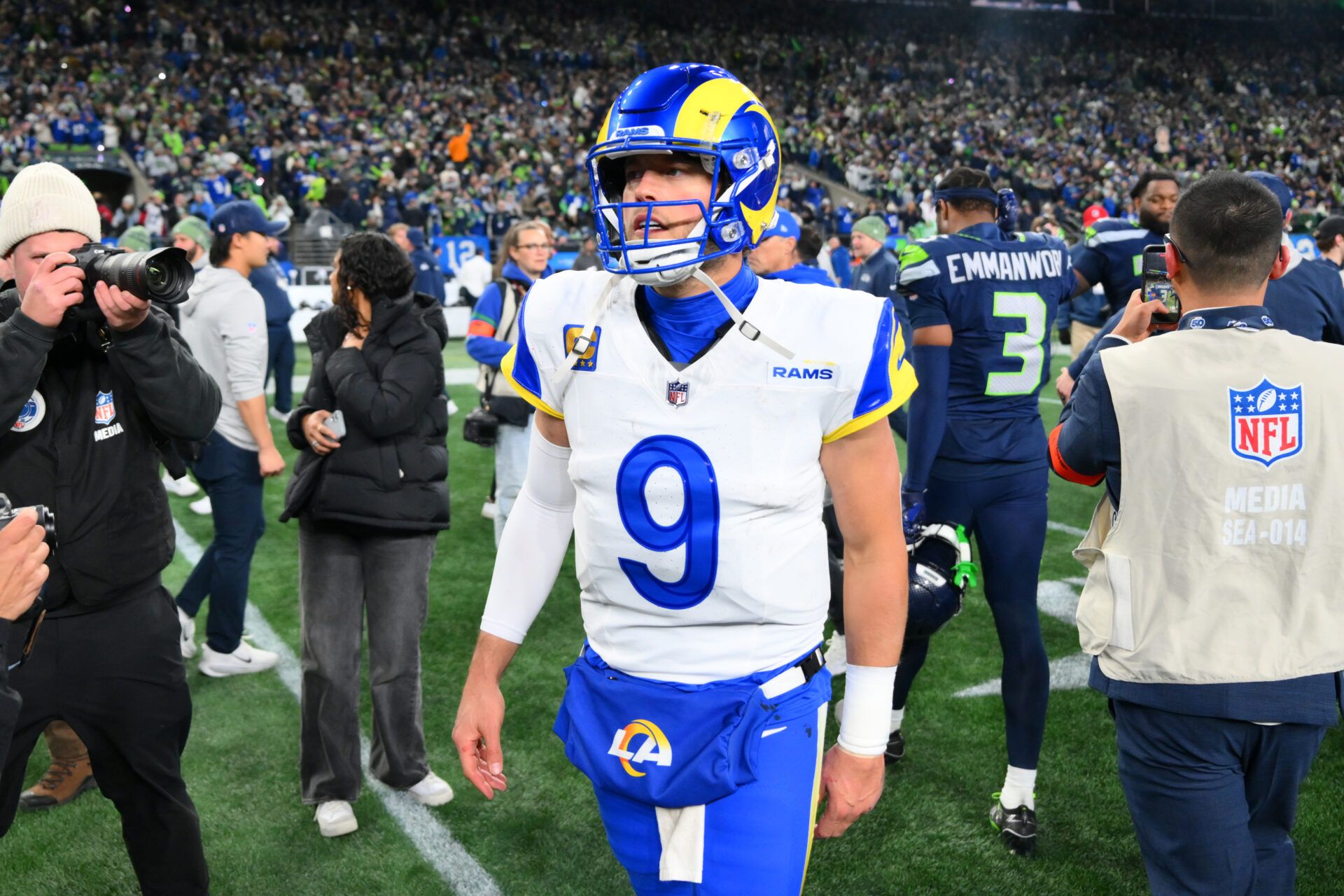 Los Angeles Rams quarterback Matthew Stafford (9) leaves the field after the 2026 NFC Championship Game against the Seattle Seahawks at Lumen Field.