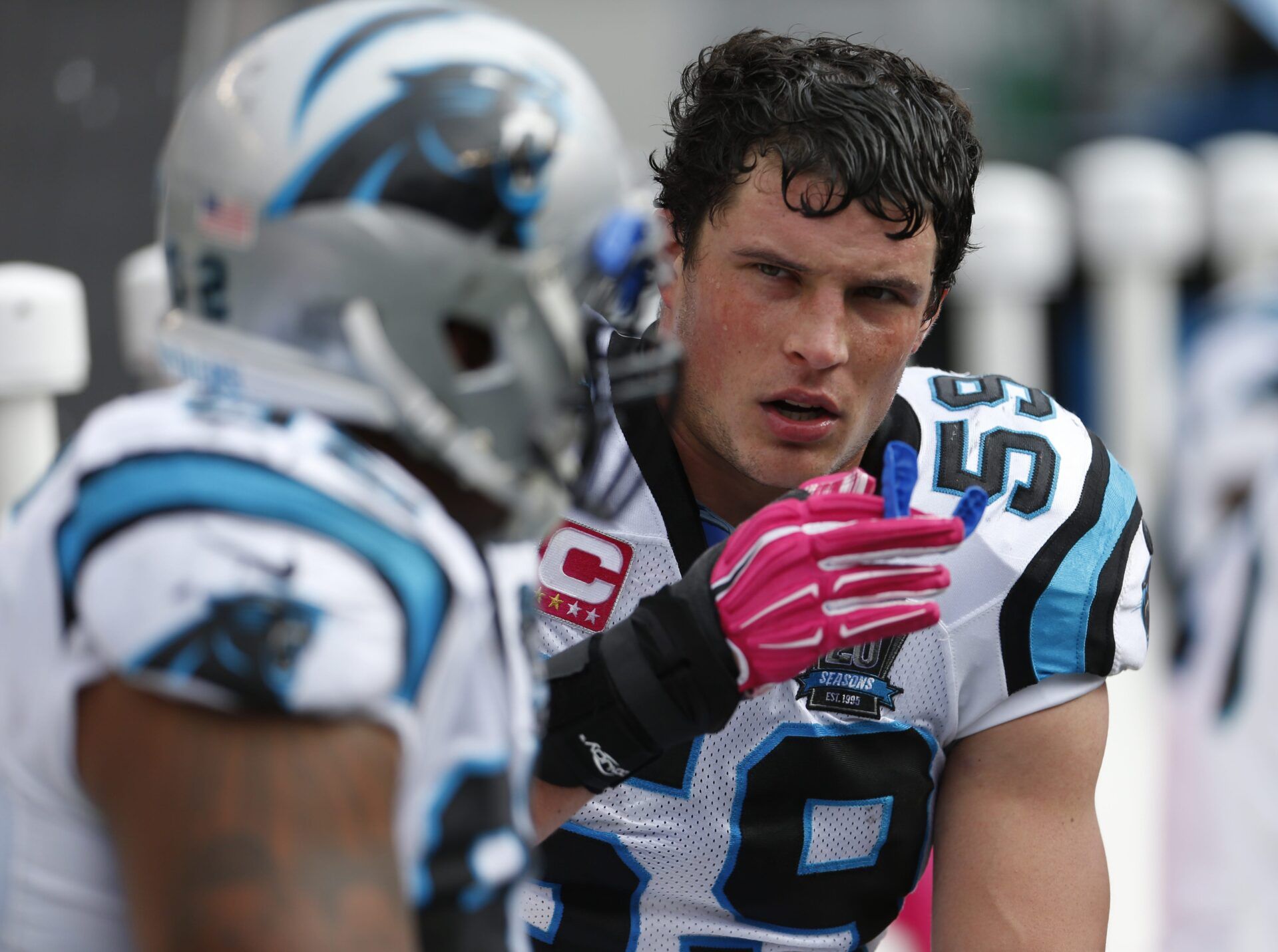 Carolina Panthers middle linebacker Luke Kuechly (59), former St. Xavier High school star, talks with a teammate on the sidelines during the fourth quarter of their game played at Paul Brown Stadium in Cincinnati, Ohio Sunday October 12, 2014.

Bengals Panther 10122014 37