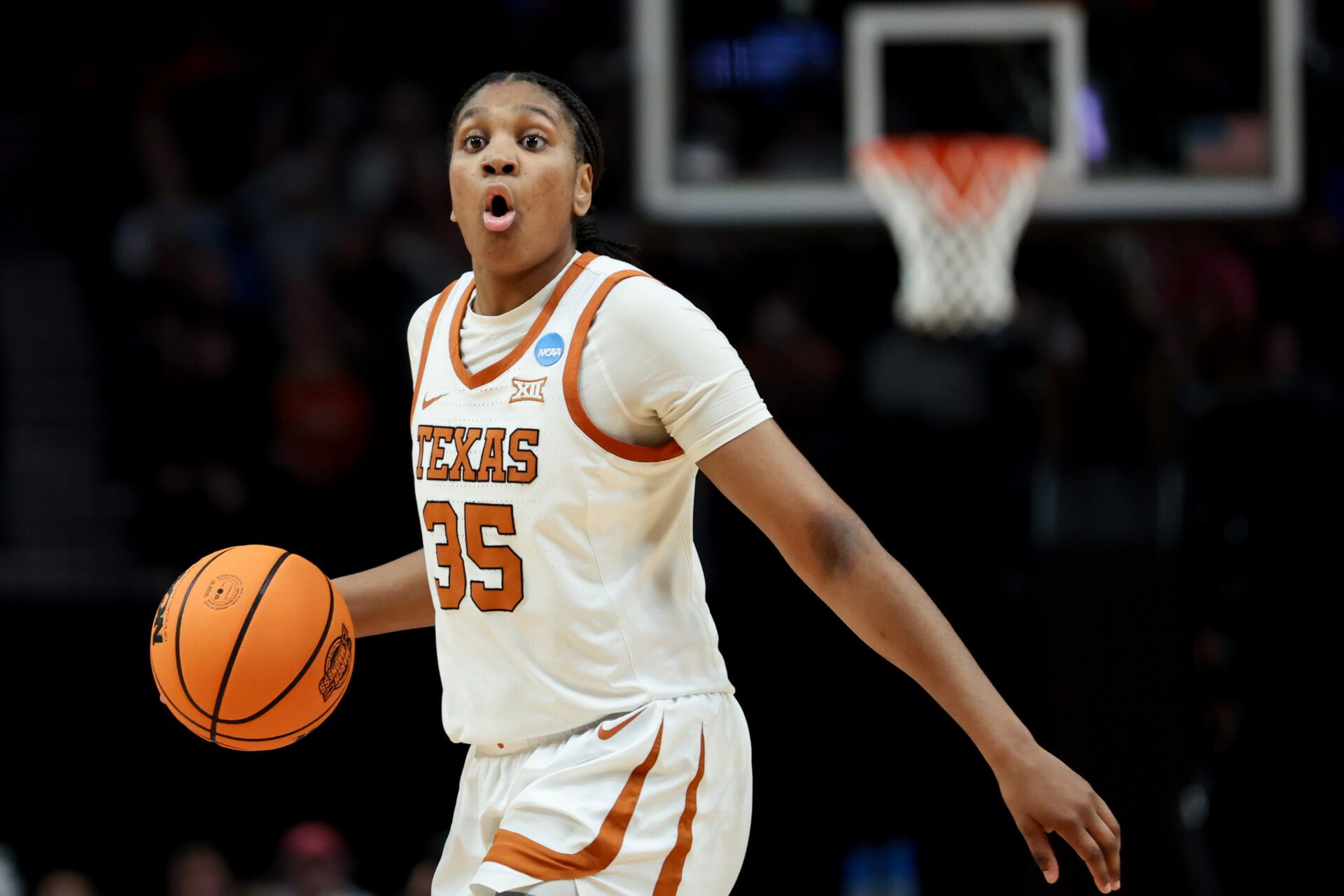 PORTLAND, OREGON - MARCH 31: Madison Booker #35 of the Texas Longhorns reacts after a play during the second half against the NC State Wolfpack in the Elite 8 round of the NCAA Women's Basketball Tournament at Moda Center on March 31, 2024 in Portland, Oregon. (Photo by Steph Chambers/Getty Images)