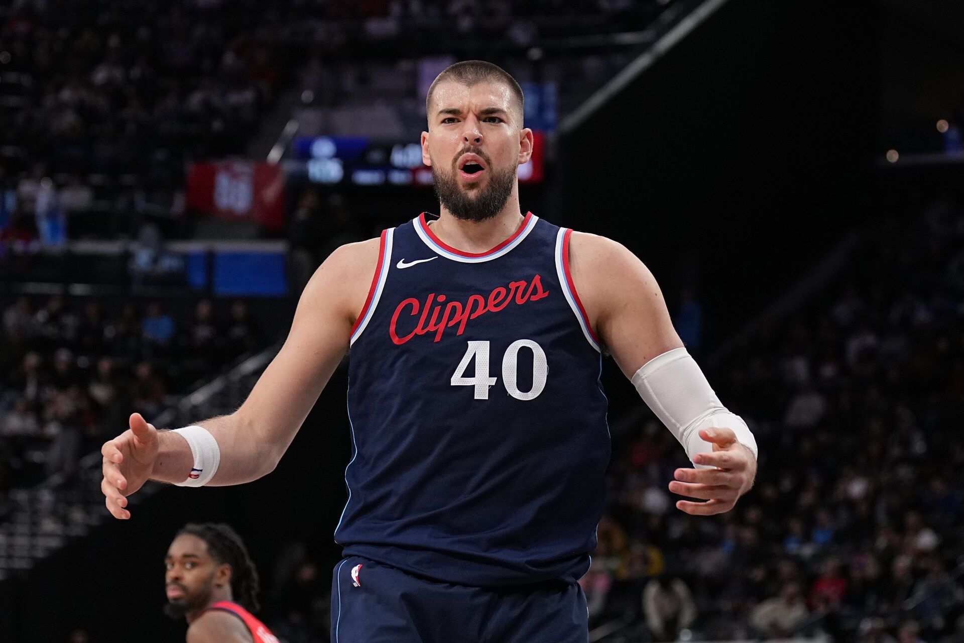 INGLEWOOD, CALIFORNIA - APRIL 02: Ivica Zubac #40 of the Los Angeles Clippers reacts after being fouled against the New Orleans Pelicans during the second half at Intuit Dome on April 02, 2025 in Inglewood, California. (Photo by Michael Owens/Getty Images)