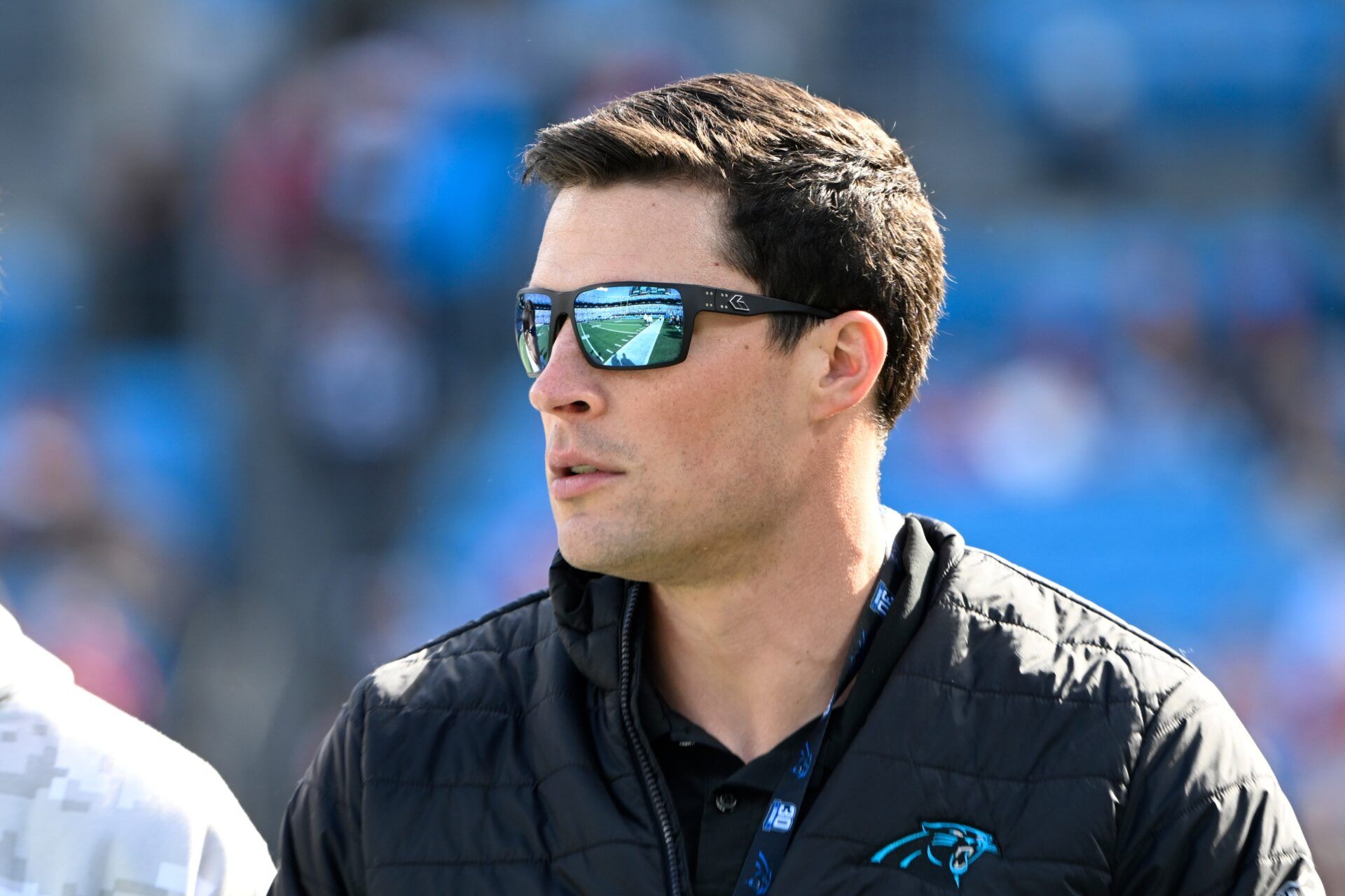 Former Carolina Panthers linebacker Luke Kuechly on the sidelines before the game at Bank of America Stadium.