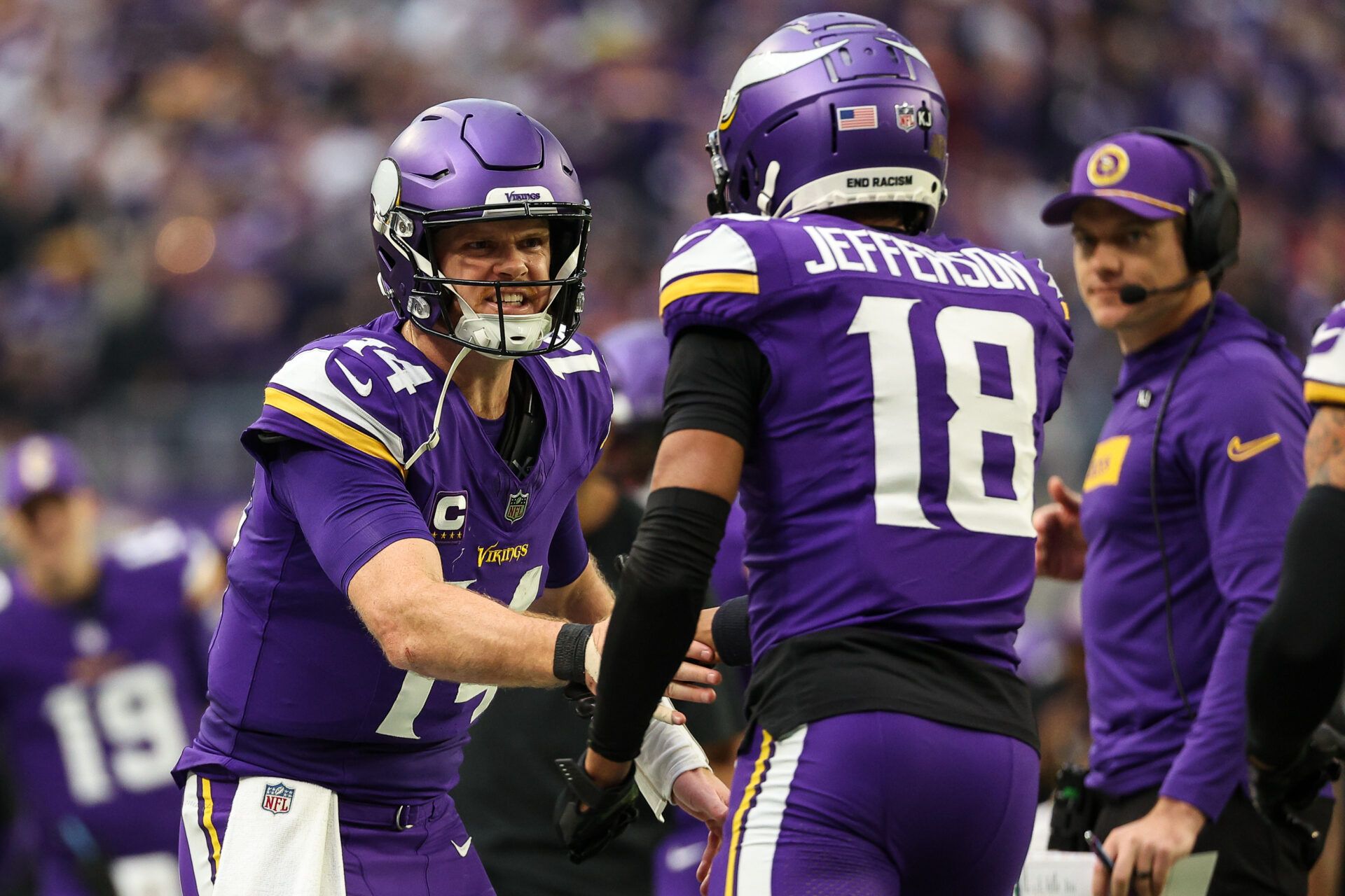 Minnesota Vikings quarterback Sam Darnold (14) celebrates his touchdown pass to wide receiver Justin Jefferson (18) against the Atlanta Falcons during the second quarter at U.S. Bank Stadium.