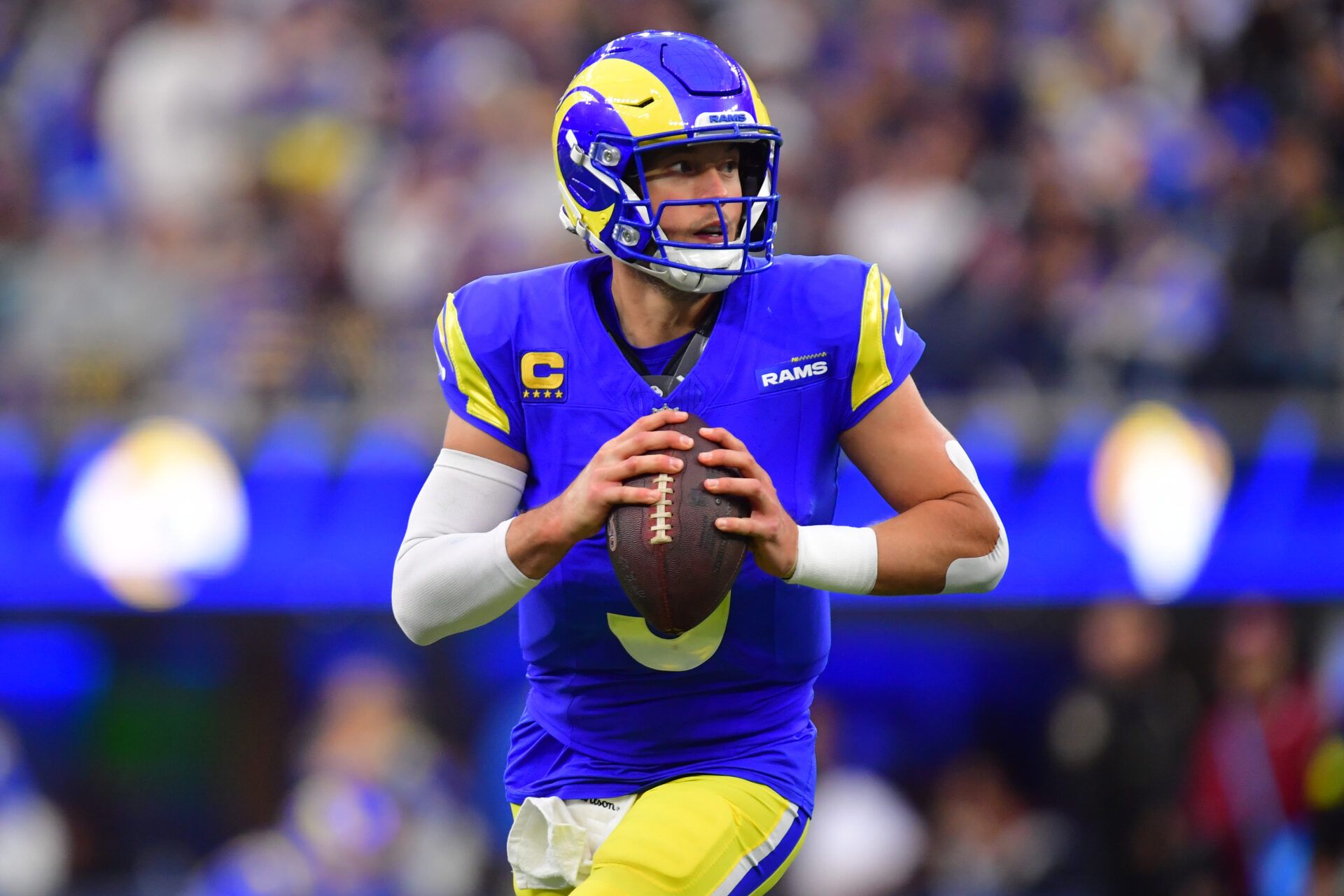 Los Angeles Rams quarterback Matthew Stafford (9) looks downfield against the Arizona Cardinals during the second half at SoFi Stadium.