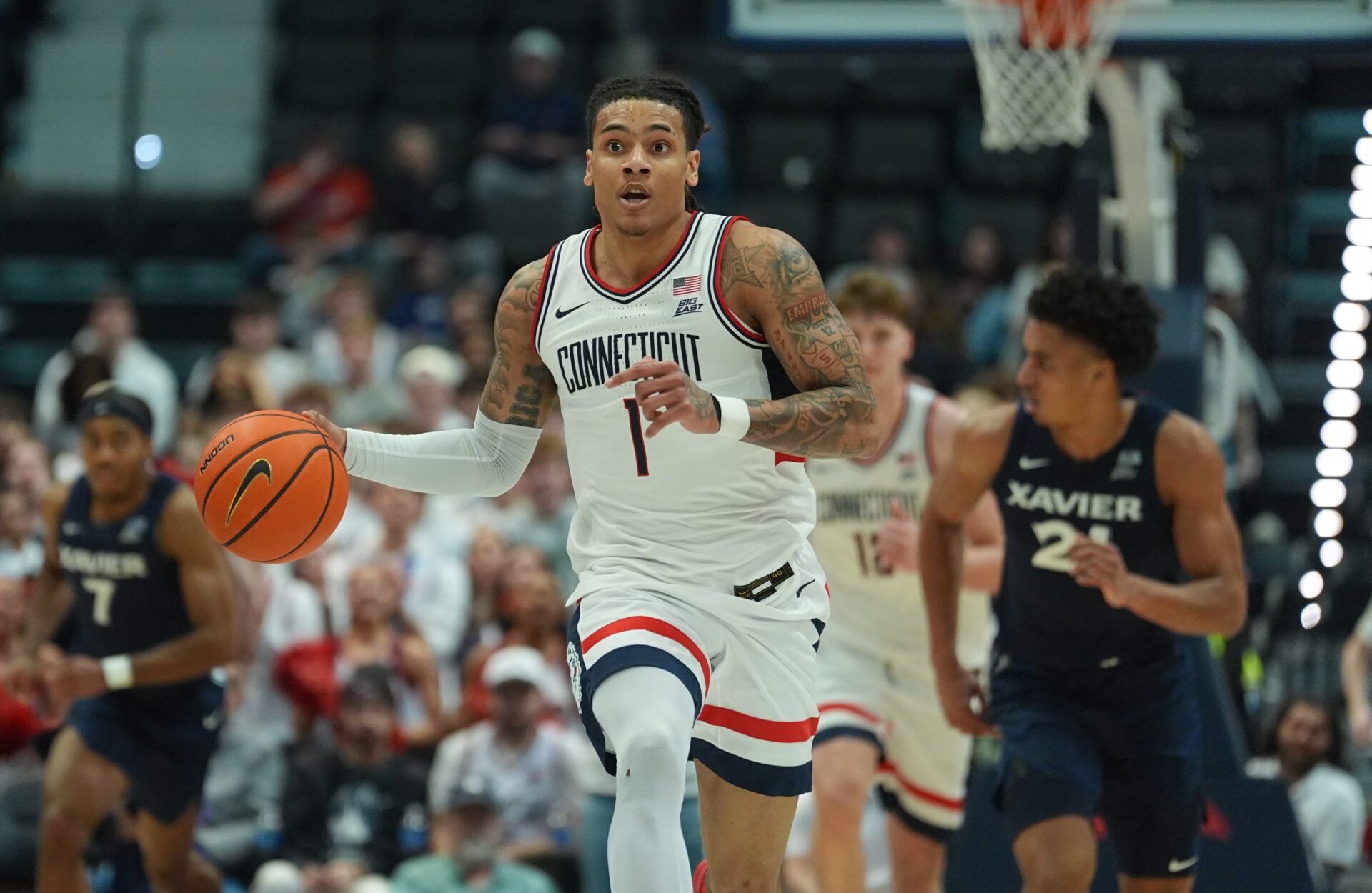 UConn Huskies guard Solo Ball (1) returns the ball against the Xavier Musketeers in the second half at PeoplesBank Arena.