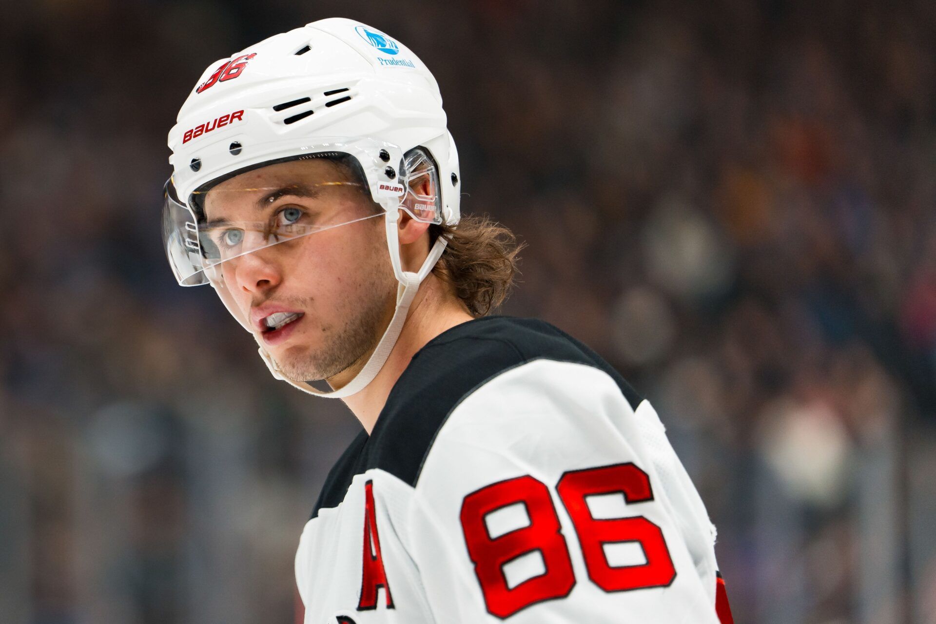 New Jersey Devils forward Jack Hughes (86) during a stop in play against the Vancouver Canucks in the first period at Rogers Arena.