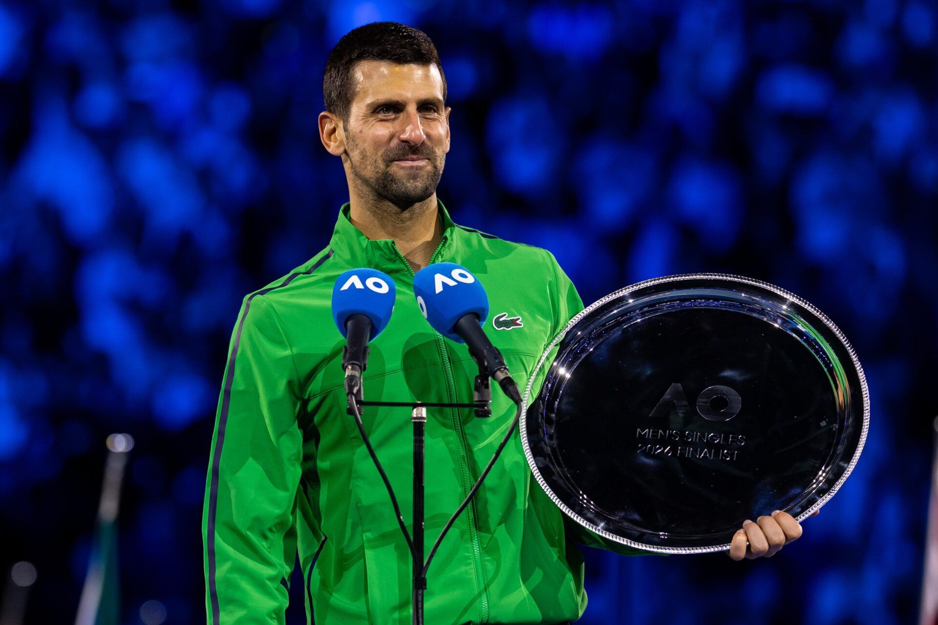 Novak Djokovic of Serbia with his finalist trophy after the final of the mens singles against Carlos Alcaraz of Spain at the Australian Open at Rod Laver Arena in Melbourne Park.