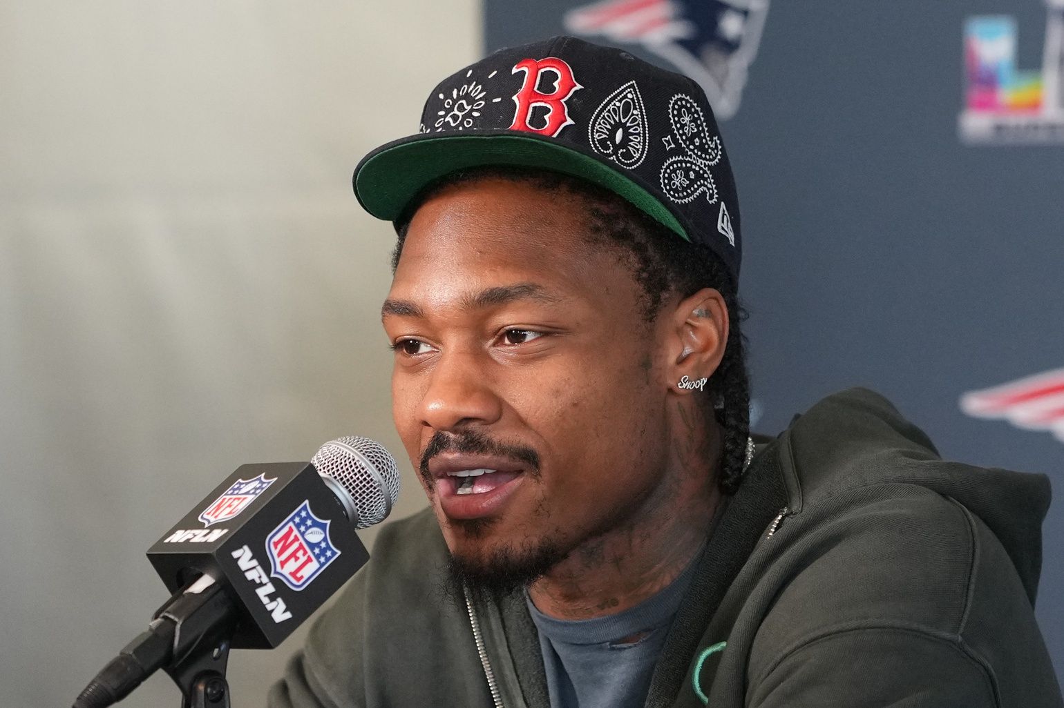 New England Patriots wide receiver Stefon Diggs (8) talks to media members at the Santa Clara Marriott.