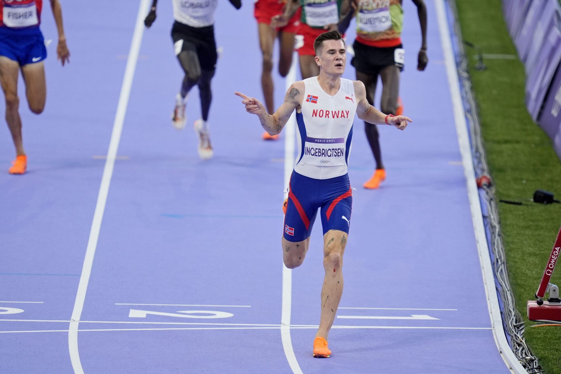 Jakob Ingebrigtsen (NOR) celebrates after winning the mens 5,000m final during the Paris 2024 Olympic Summer Games at Stade de France.