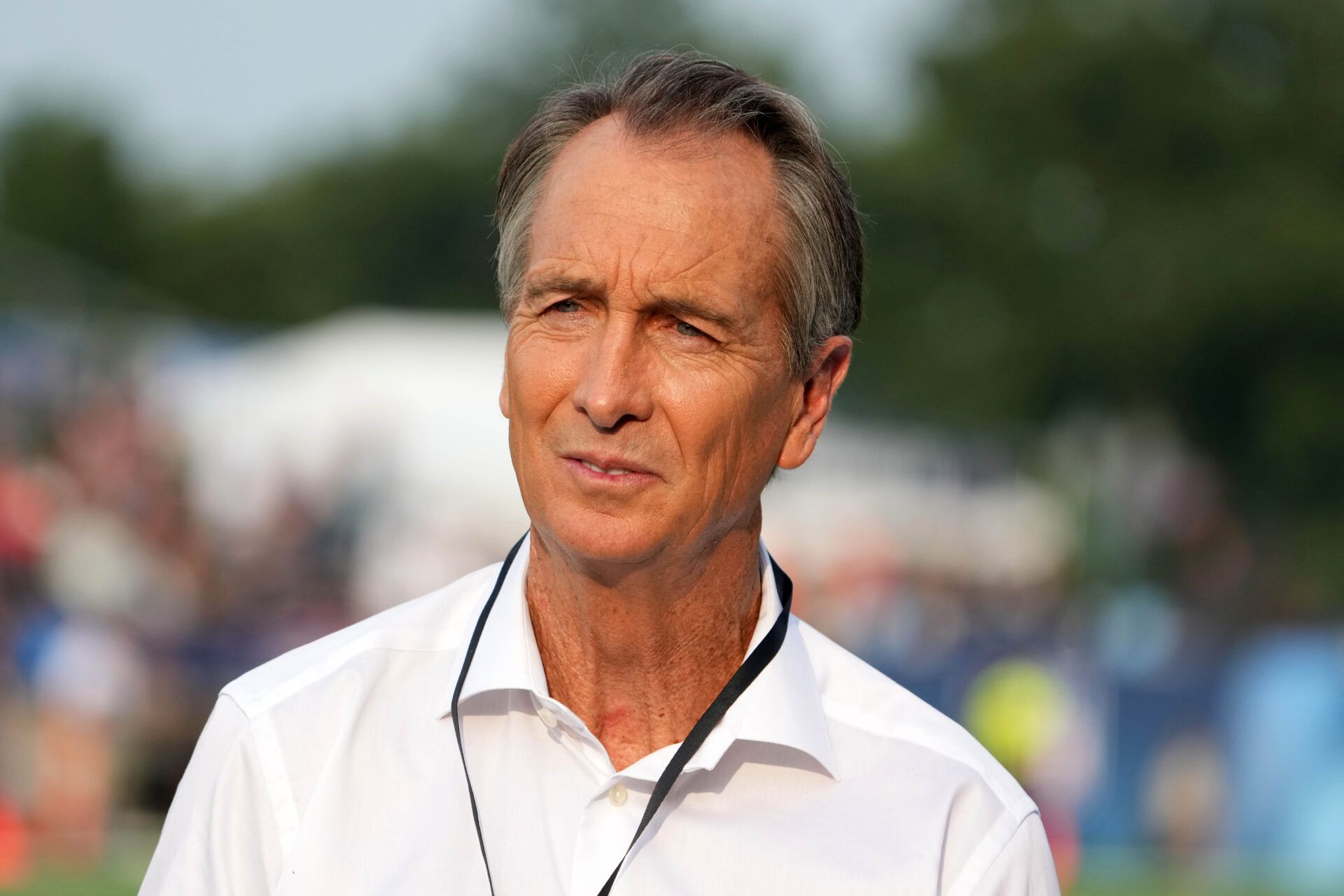 NBC Sports broadcaster Cris Collinsworth watches from the sidelines during a preseason game between the Cleveland Browns and the New York Jets at Tom Benson Hall of Fame Stadium.