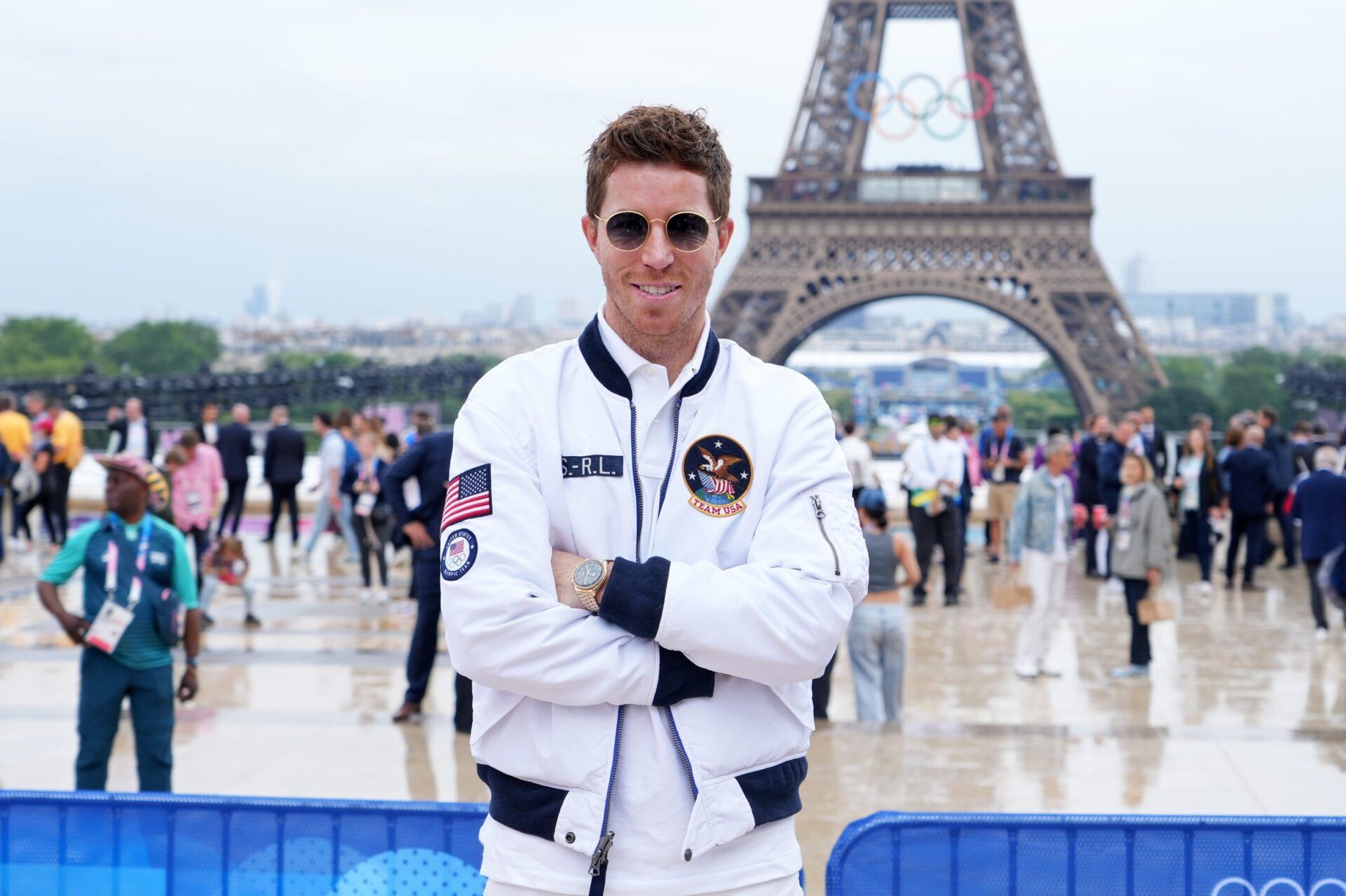 Shaun White poses for a photo in front of the Eiffel Tower before the Opening Ceremony for the Paris 2024 Olympic Summer Games.