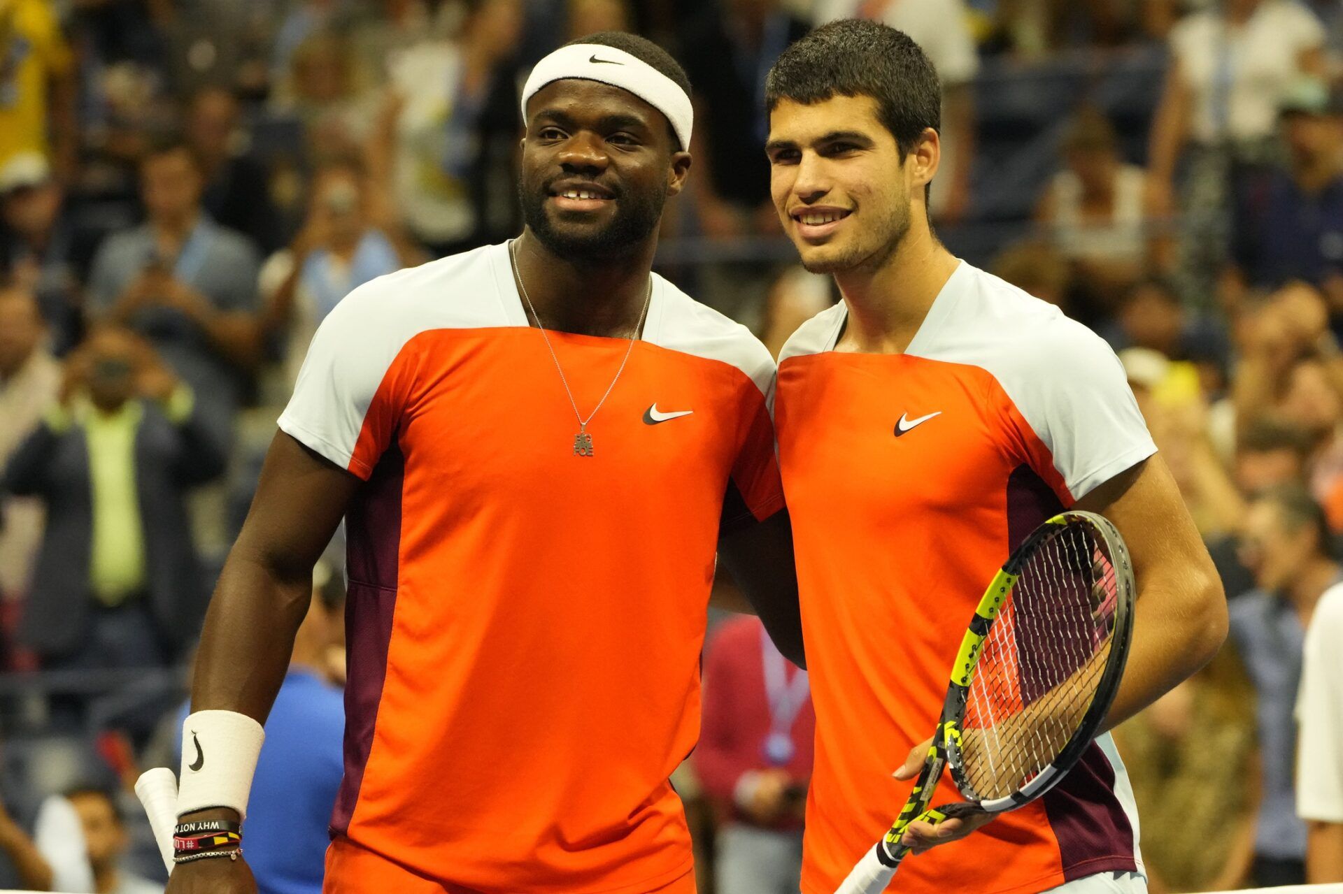 Frances Tiafoe (USA) (L) and Carlos Alcaraz (ESP) (R) pose for a picture prior to their match in a men's singles semifinal on day twelve of the 2022 U.S. Open tennis tournament at USTA Billie Jean King Tennis Center.