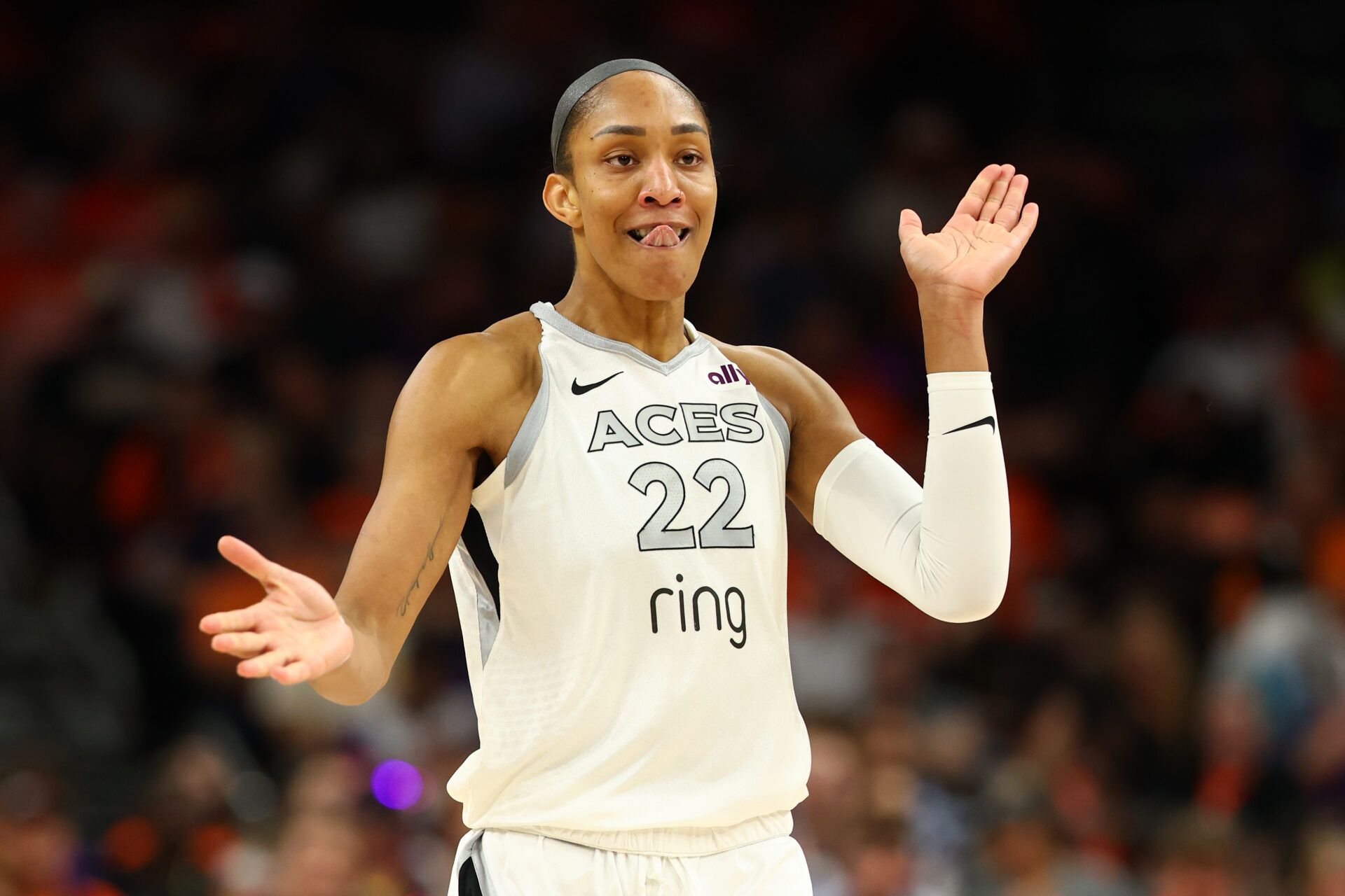 Las Vegas Aces center A'ja Wilson (22) reacts against the Phoenix Mercury in the second half during game three of the 2025 WNBA Finals at PHX Arena.