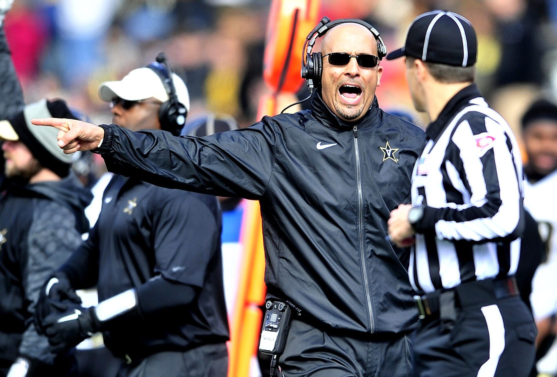 Vanderbilt Coach James Franklin, left, yells at an official in their game against Houston during the BBVA Compass Bowl at Legion Field in Birmingham, Ala., on Jan. 4, 2014.