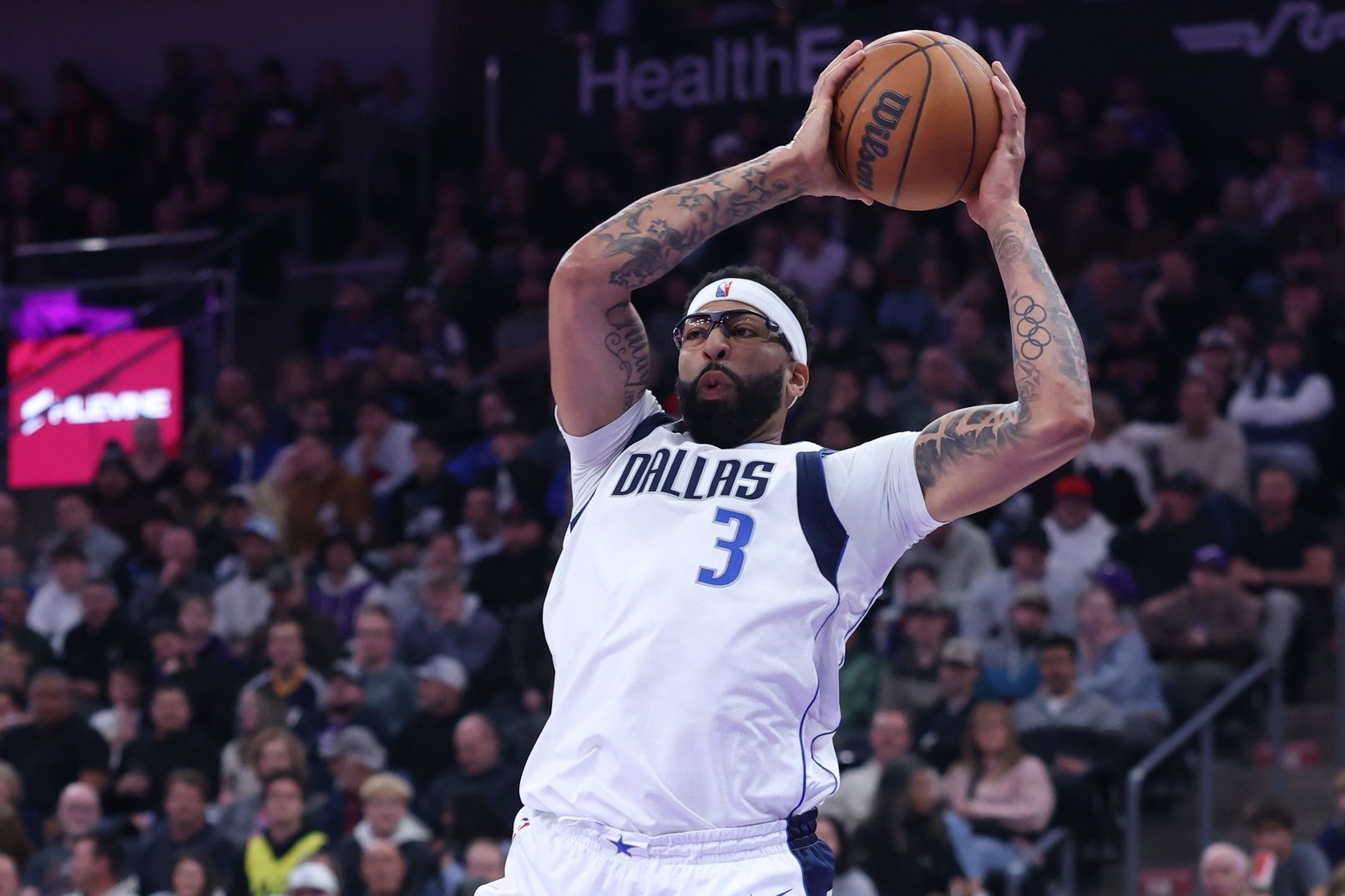 Dallas Mavericks forward Anthony Davis (3) looks to pass against the Utah Jazz during the first half at Delta Center.