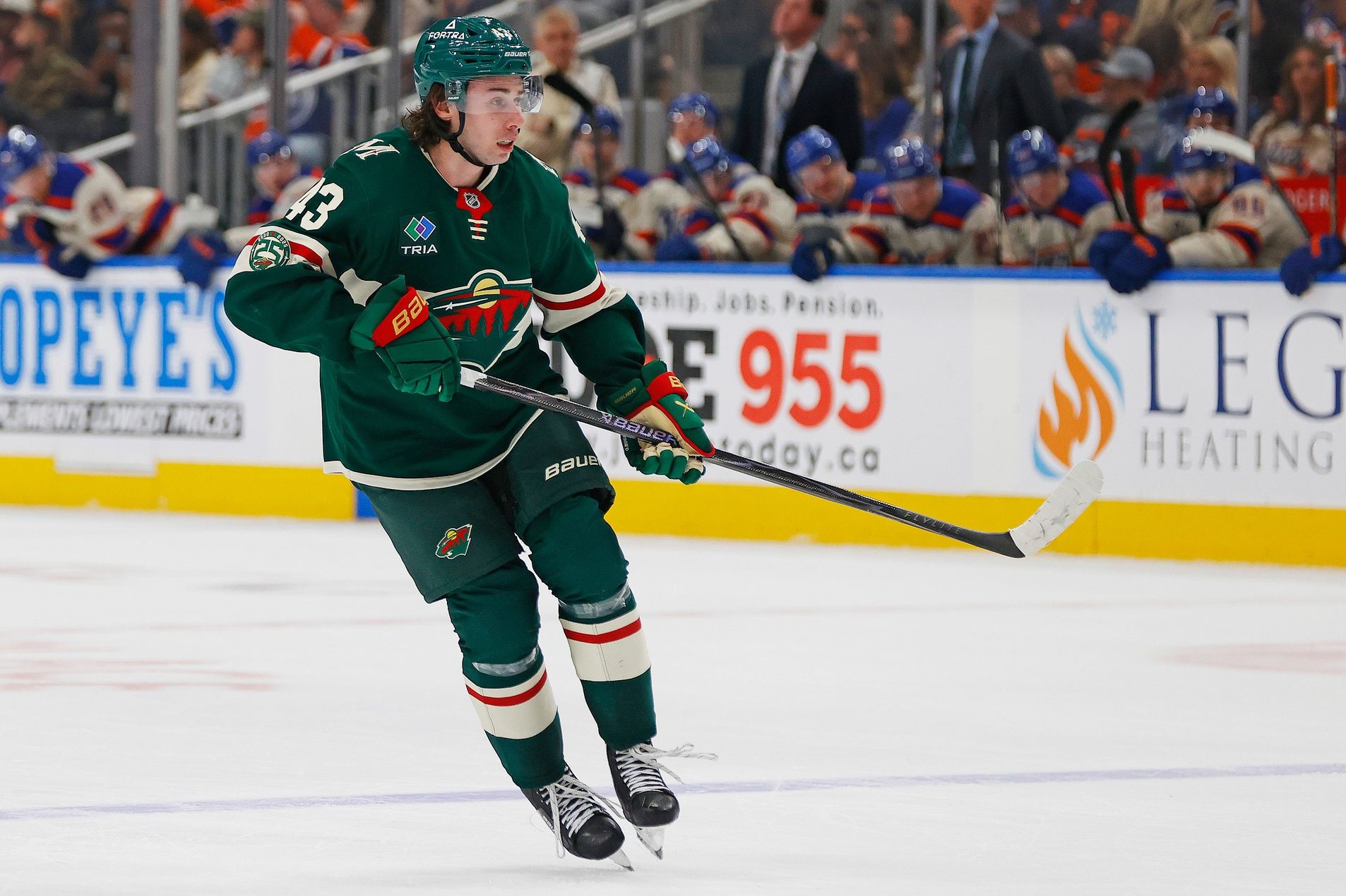 Minnesota Wild defensemen Quinn Hughes (43) follows the play against the Edmonton Oilers at Rogers Place.