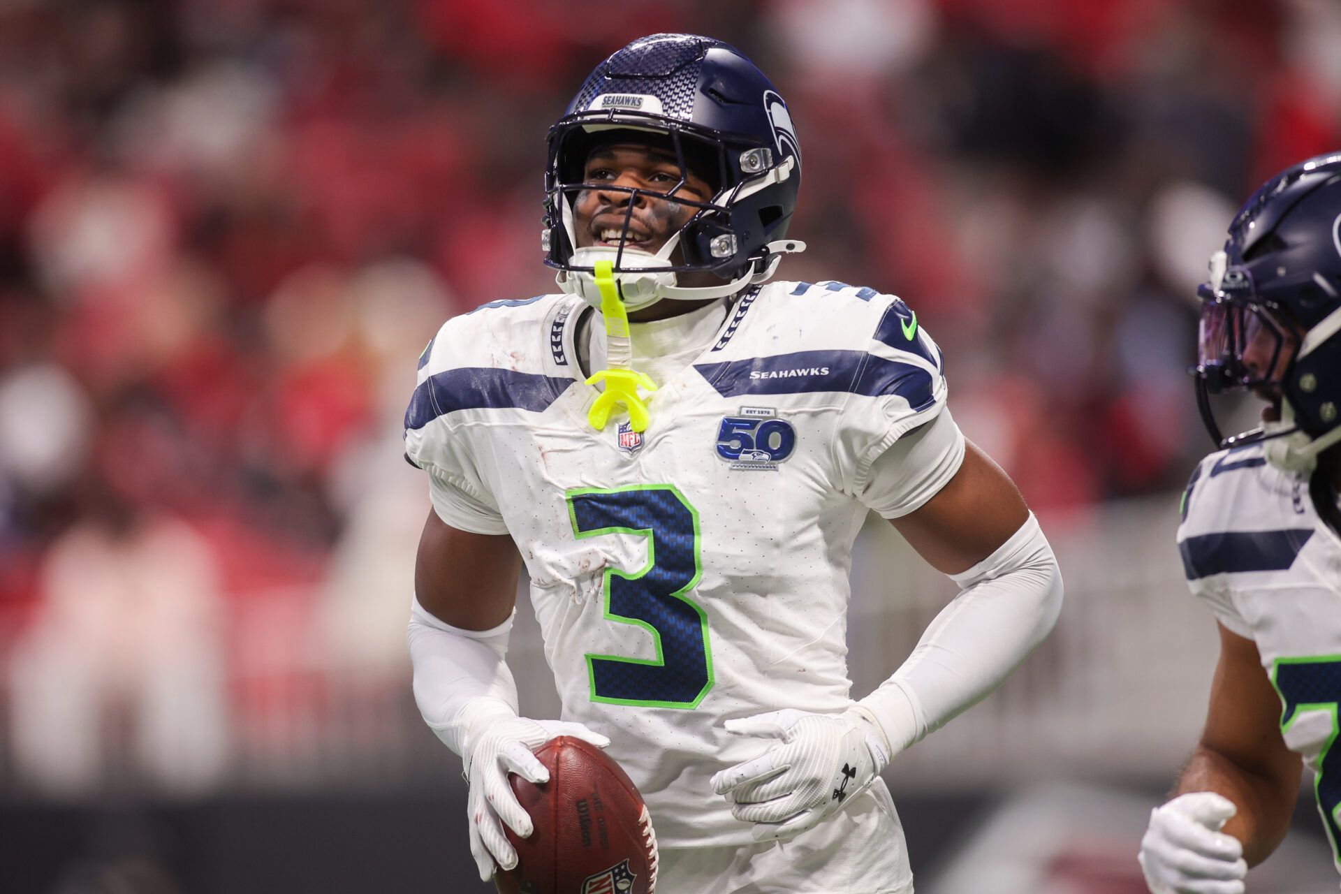 Seattle Seahawks safety Nick Emmanwori (3) celebrates after an interception against the Atlanta Falcons in the third quarter at Mercedes-Benz Stadium.