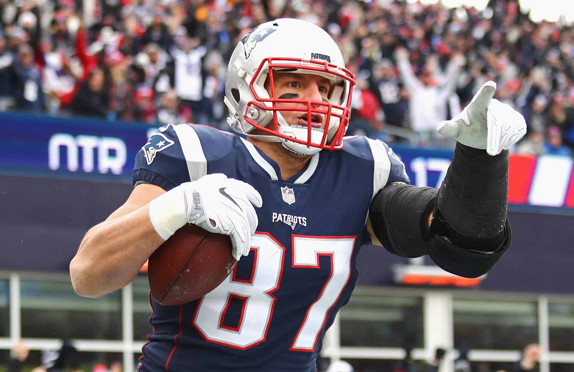FOXBORO, MA - DECEMBER 24:  Rob Gronkowski #87 of the New England Patriots reacts after catching a touchdown pass during the second quarter of a game against the Buffalo Bills at Gillette Stadium on December 24, 2017 in Foxboro, Massachusetts.  (Photo by Tim Bradbury/Getty Images)