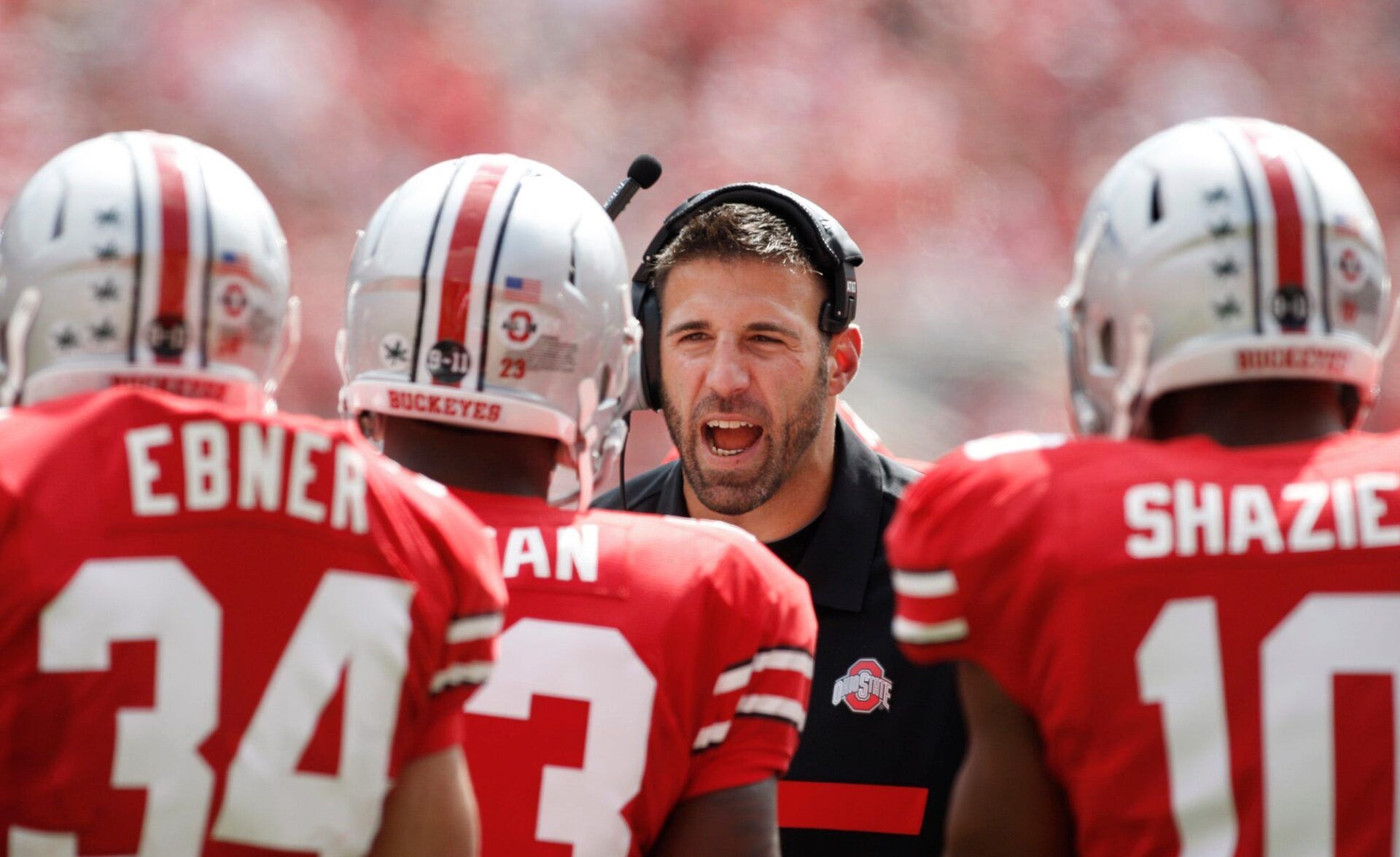 Assistant coach Mike Vrabel gives instructions during a break in an NCAA College football game between the Ohio State Buckeyes and University of Toledo Rockets at Ohio Stadium, September 10, 2011.
