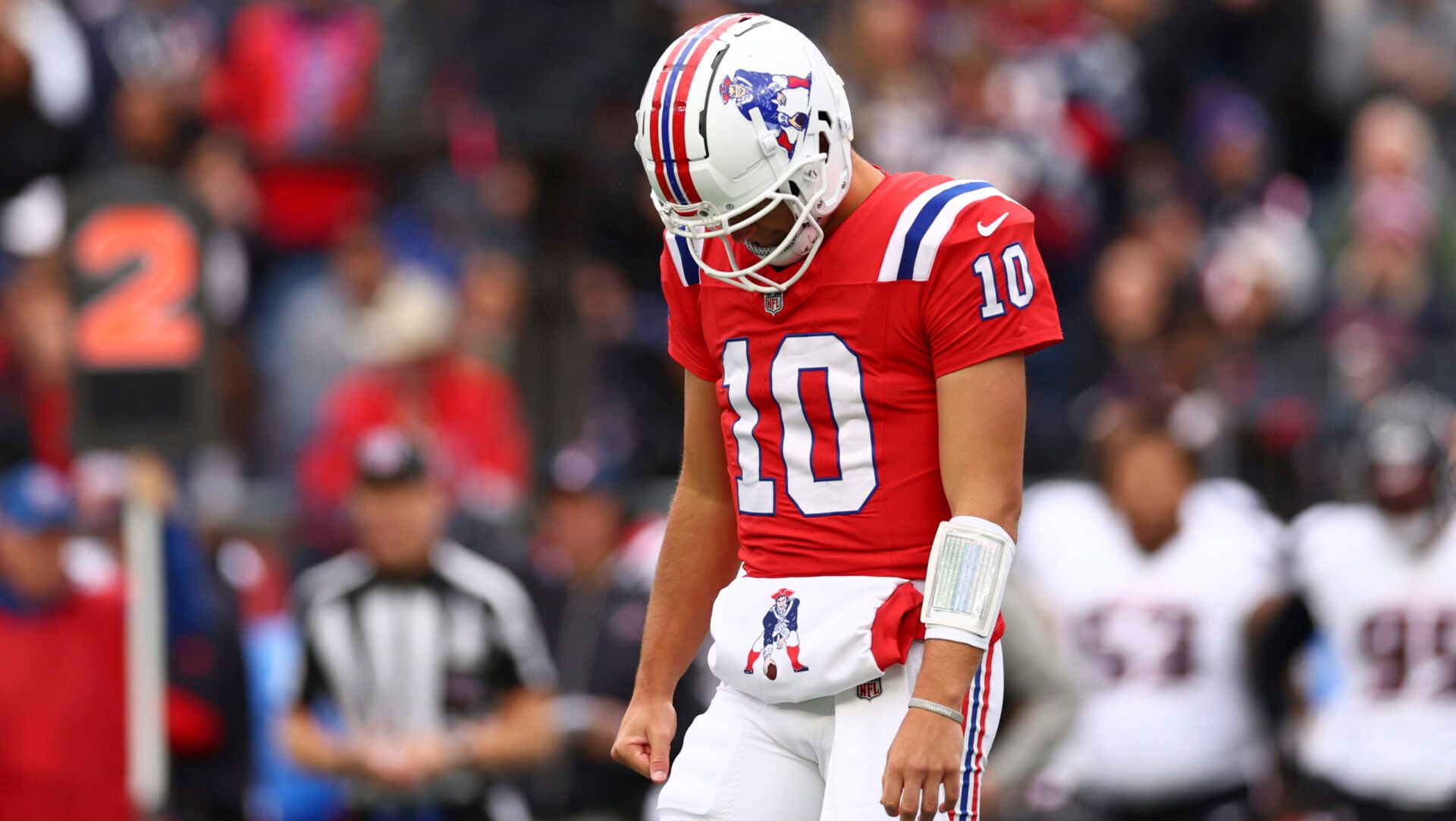 FOXBOROUGH, MASSACHUSETTS - OCTOBER 13: Drake Maye #10 of the New England Patriots reacts in his first NFL start during the first half against the Houston Texans at Gillette Stadium on October 13, 2024 in Foxborough, Massachusetts. (Photo by Maddie Meyer/Getty Images)