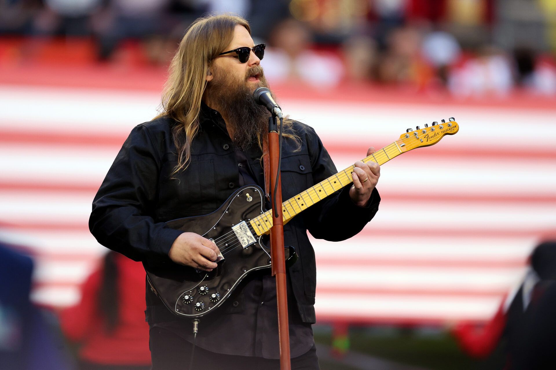 GLENDALE, ARIZONA - FEBRUARY 12: Chris Stapleton performs the national anthem before Super Bowl LVII between the Kansas City Chiefs and the Philadelphia Eagles at State Farm Stadium on February 12, 2023 in Glendale, Arizona. (Photo by Gregory Shamus/Getty Images)