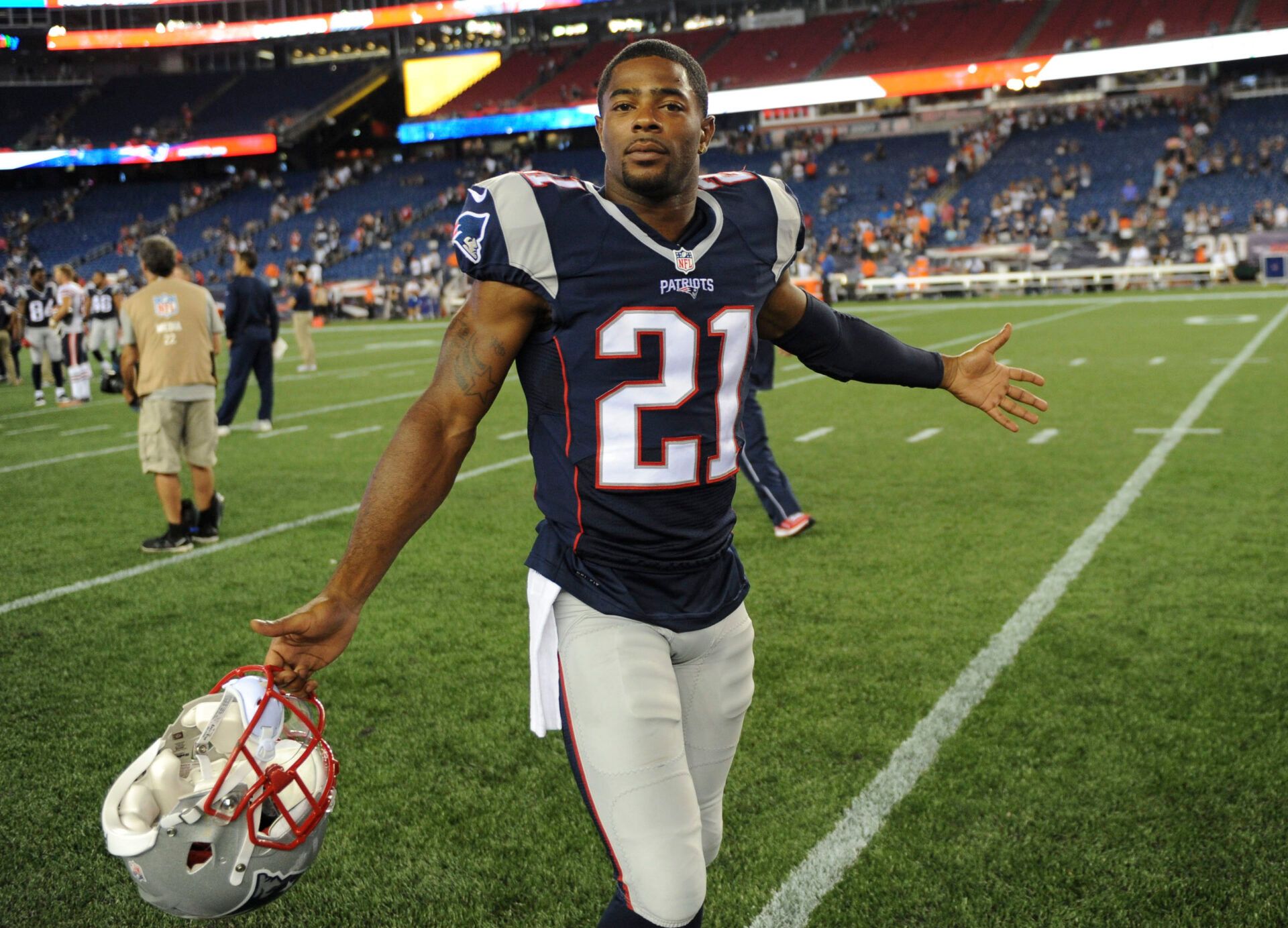 New England Patriots cornerback Malcolm Butler (21) walks off the field after defeating the Chicago Bears at Gillette Stadium.
