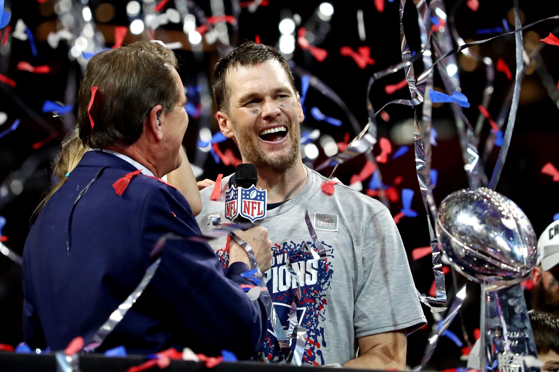 New England Patriots quarterback Tom Brady (12) is interviewed by CBS announcer Jim Nantz after beating the Los Angeles Rams in Super Bowl LIII at Mercedes-Benz Stadium.