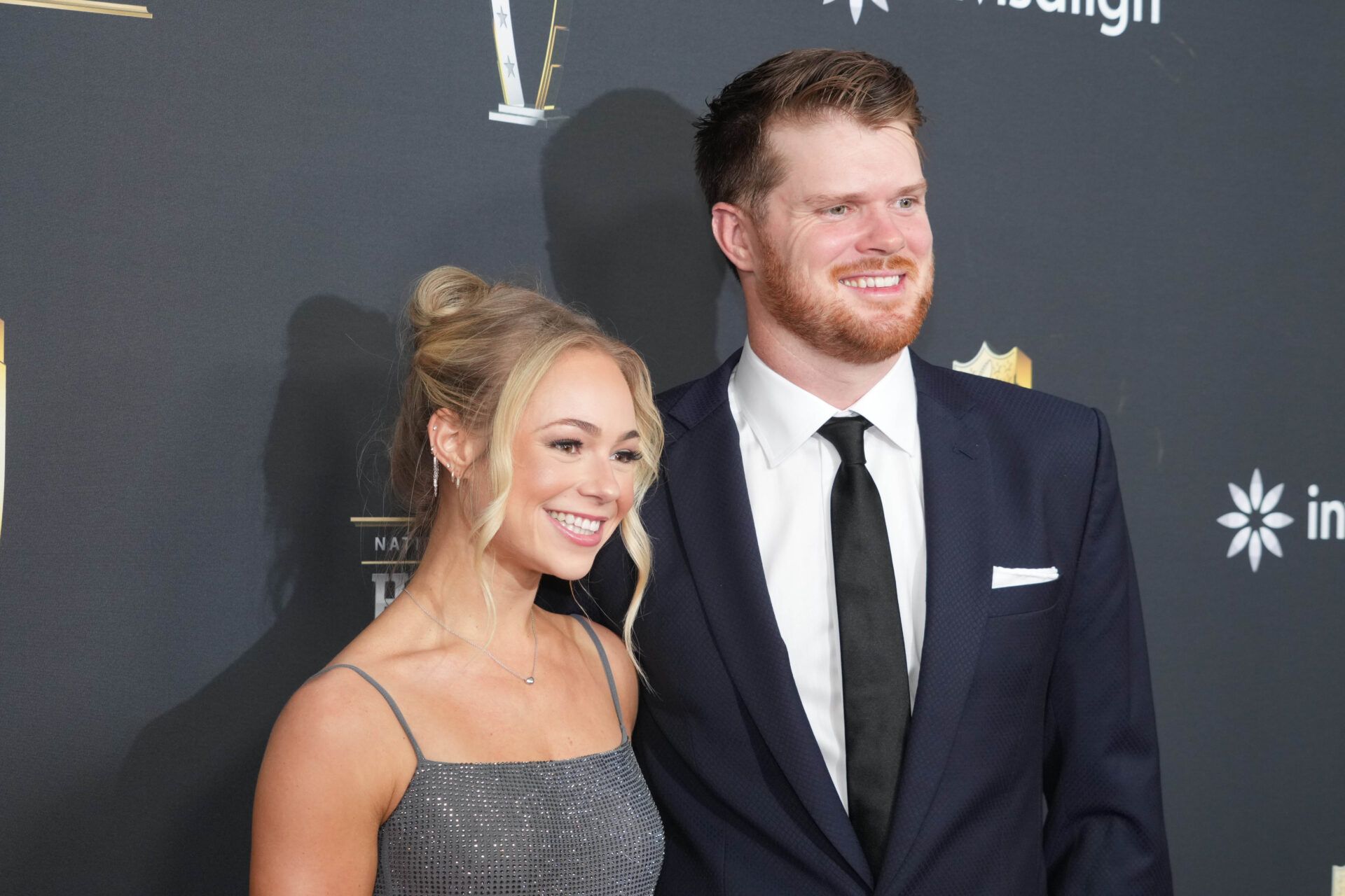 Sam Darnold and Katie Hoofnagle on the red carpet before Super Bowl LIX NFL Honors at Saenger Theatre.